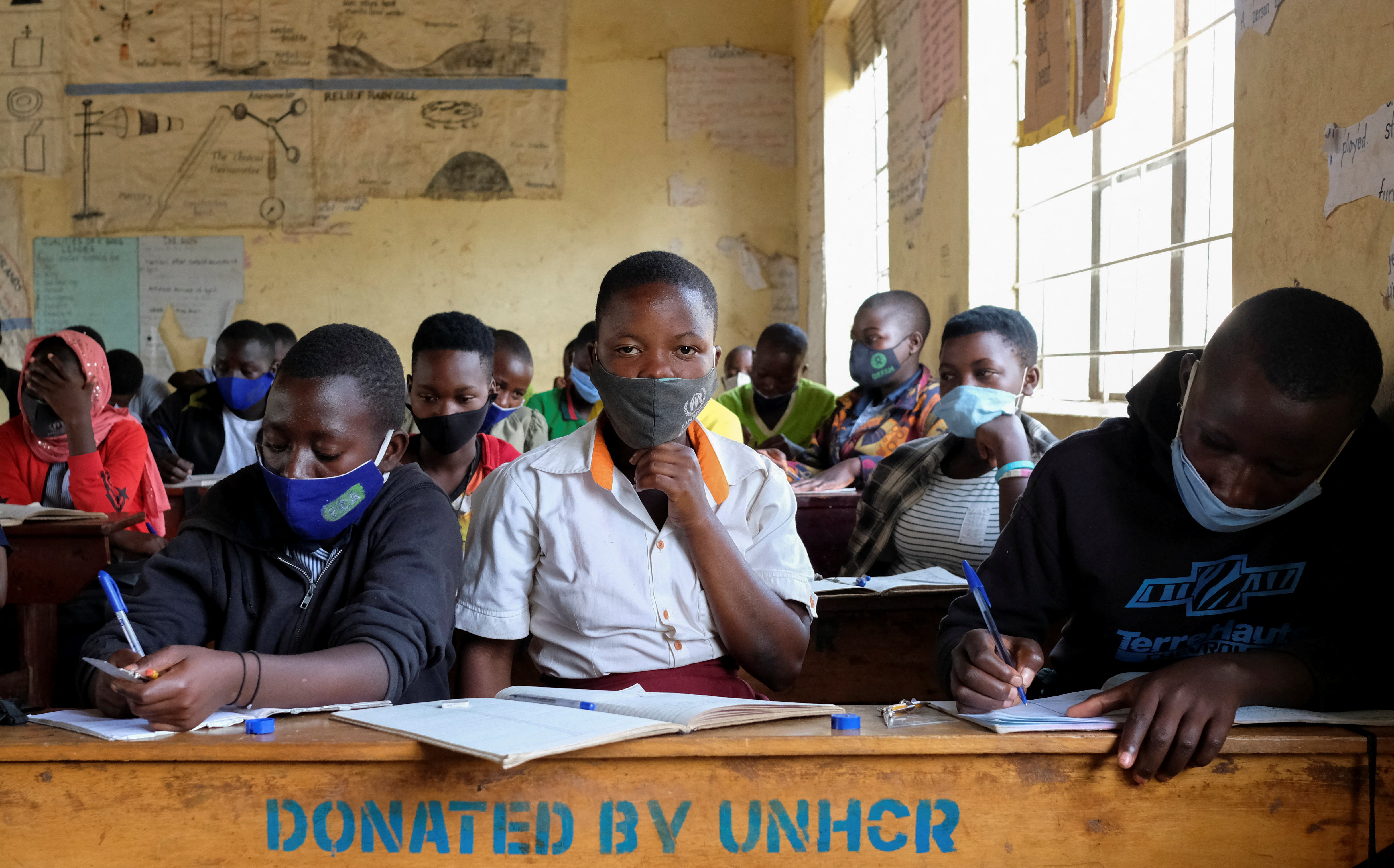 Students sit inside a classroom