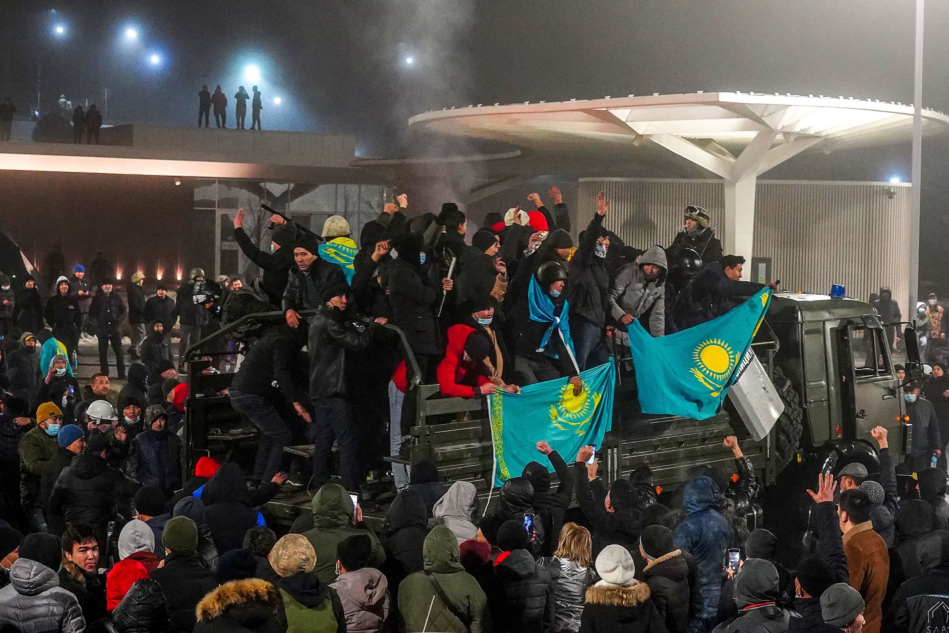 Protesters take part in a rally over a hike in energy prices in Almaty, Kazakhstan