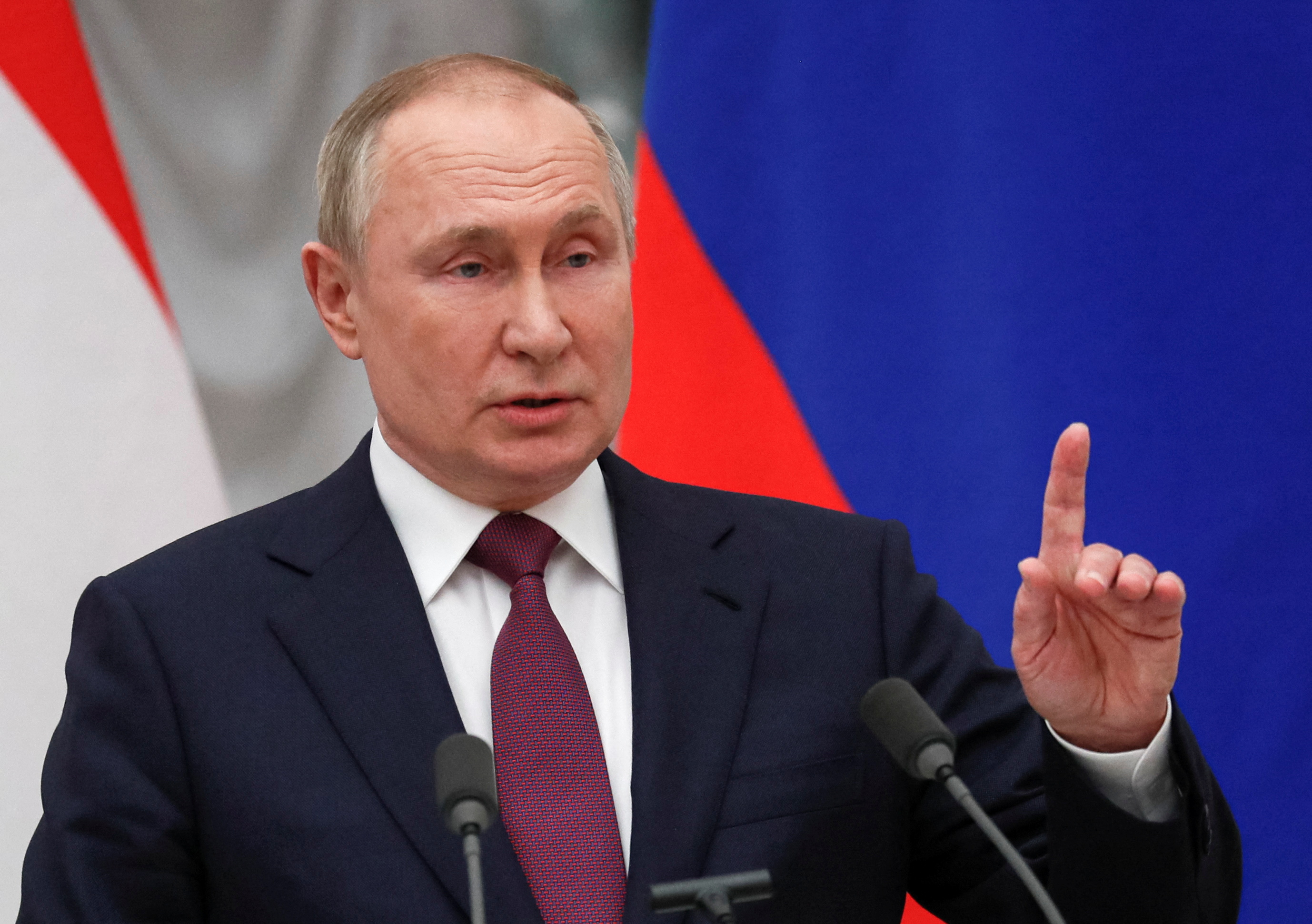 Russian President Vladimir Putin speaks during a news conference following talks with Hungarian Prime Minister Viktor Orban
