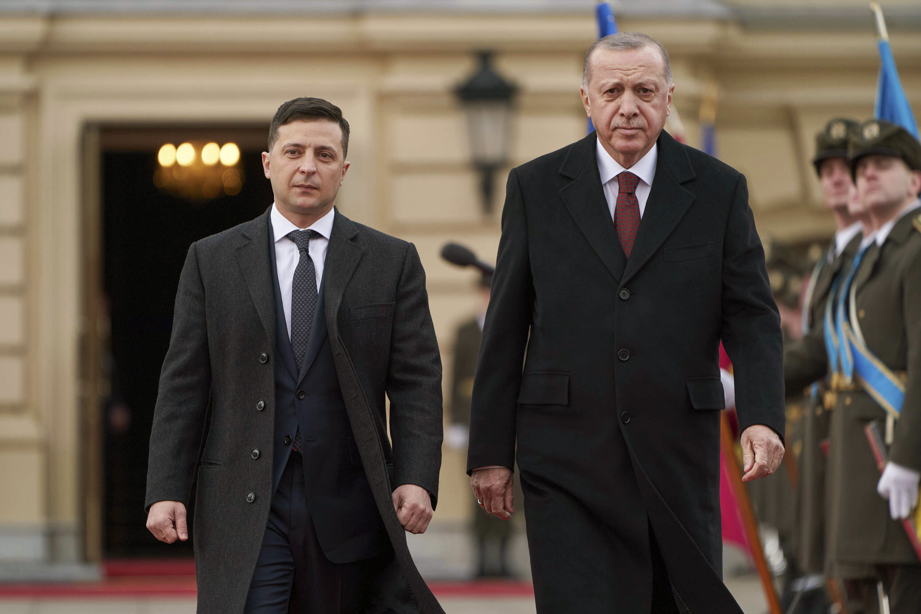 Ukrainian President Volodymyr Zelenskyy walks with Turkish President Recep Tayyip Erdogan