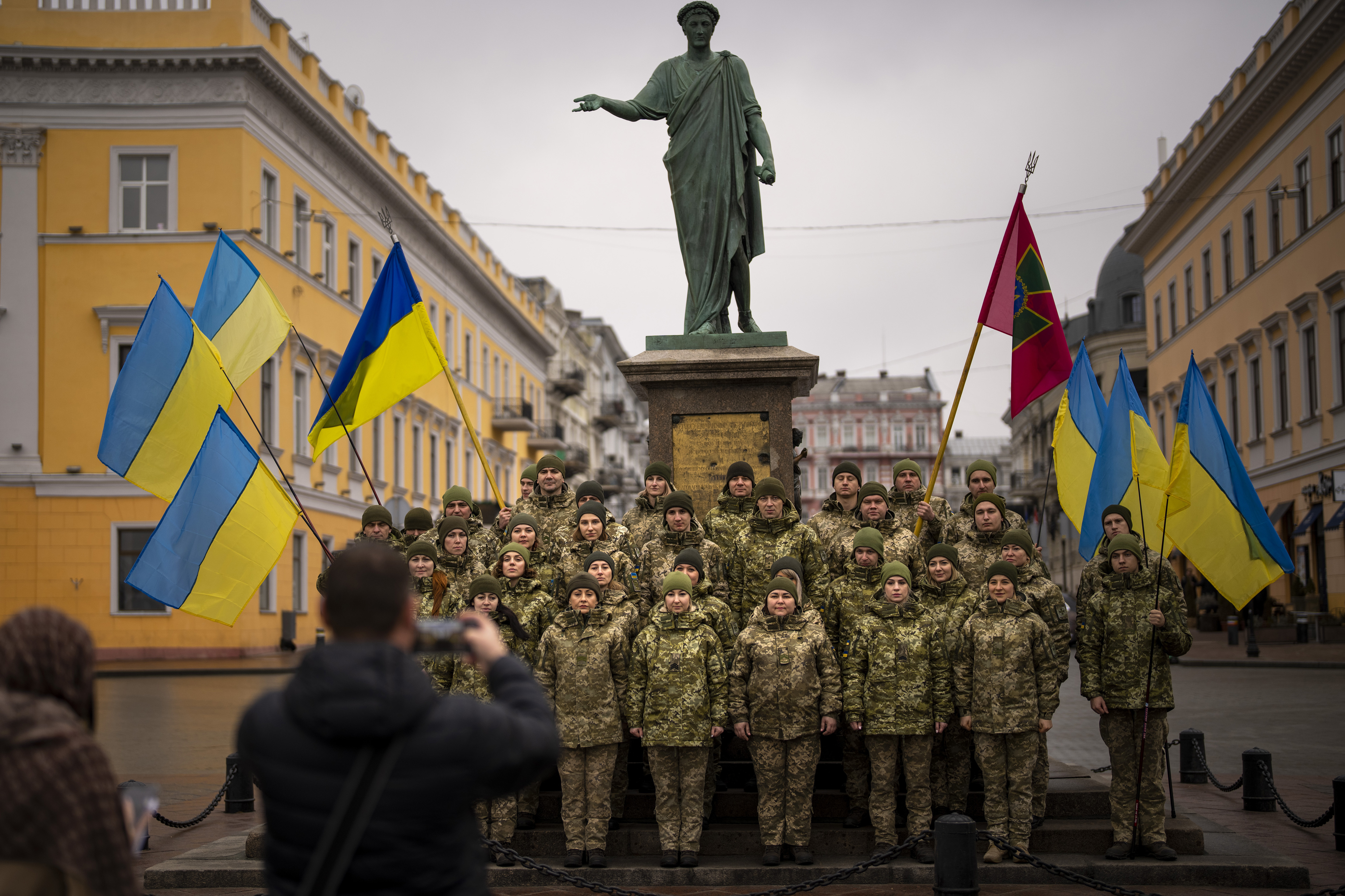 Ukrainian Army soldiers pose for a photo as they gather to celebrate a Day of Unity in Odessa