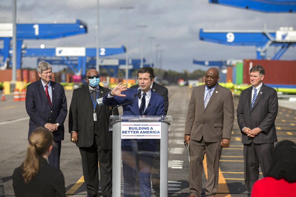 Transportation Secretary Pete Buttigieg speaks to the media