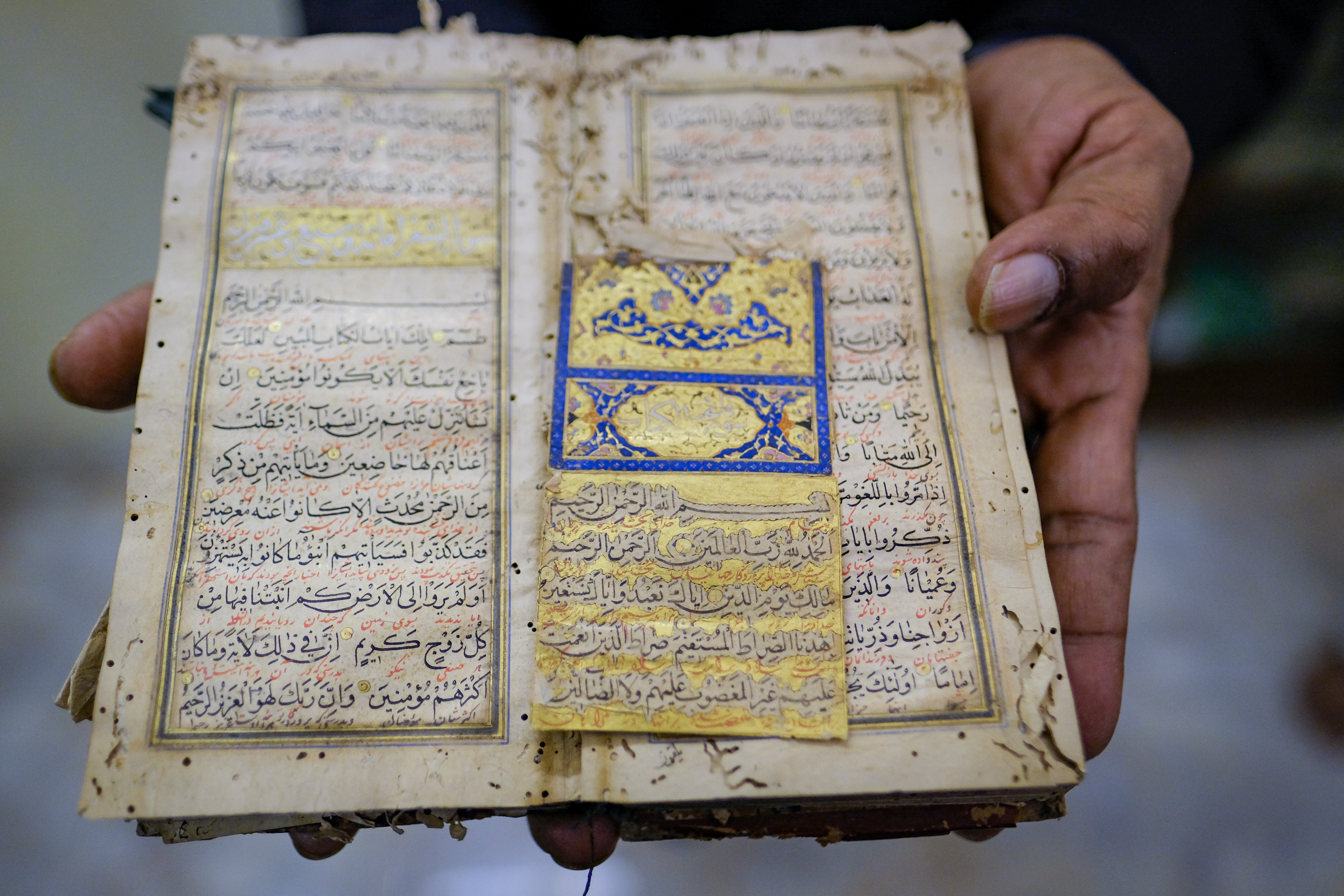 Emran offered a peek at a 400-year-old illuminated Quran written by his ancestor Munshi Alam