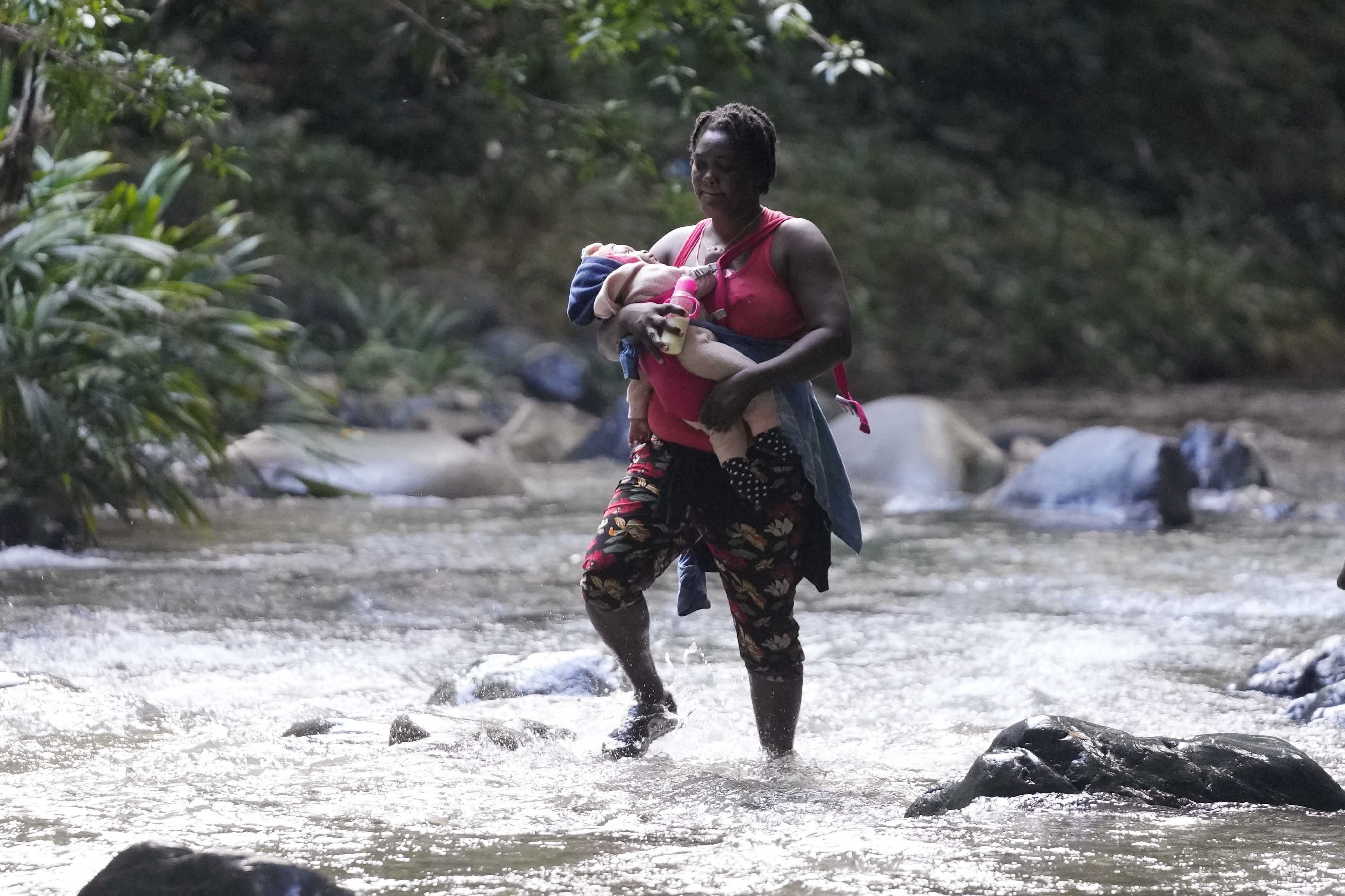Woman crossing Darien Gap