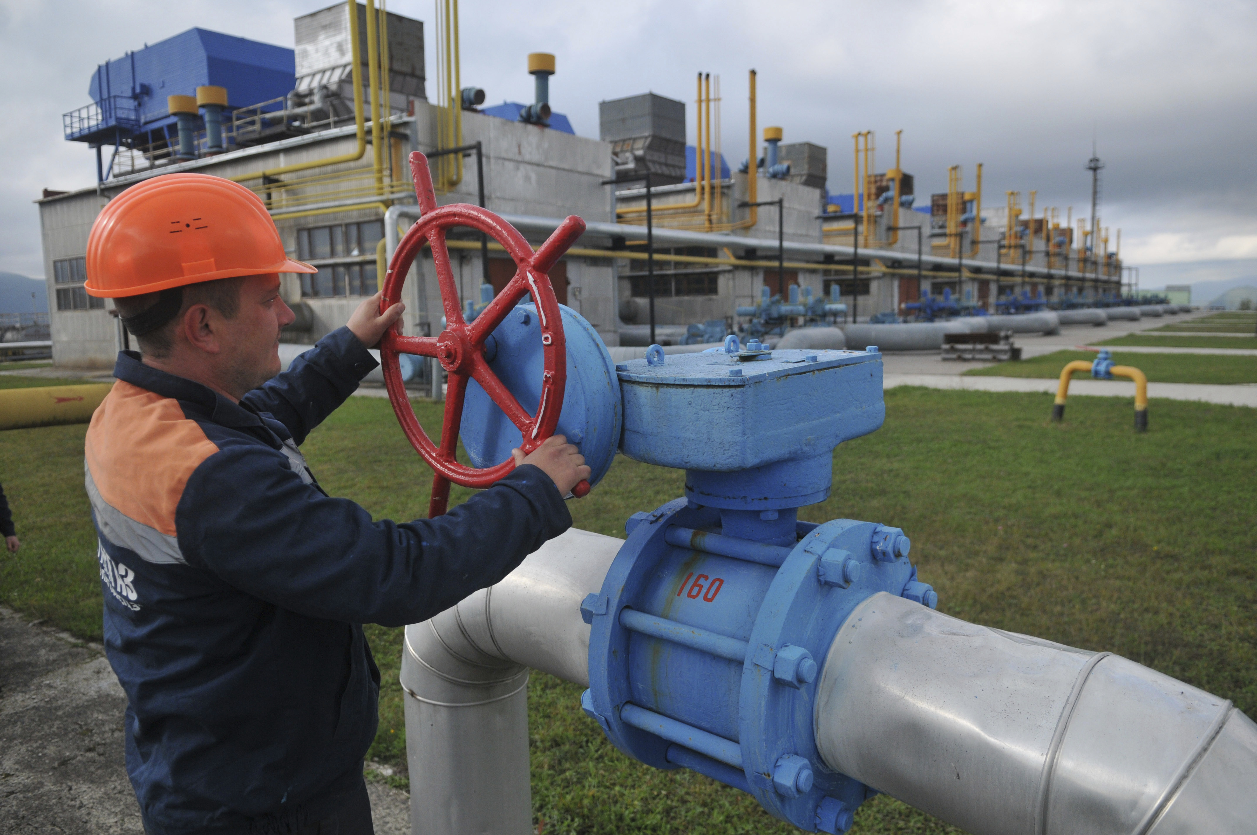 A worker at a Ukrainian gas station in Volovets, western Ukraine