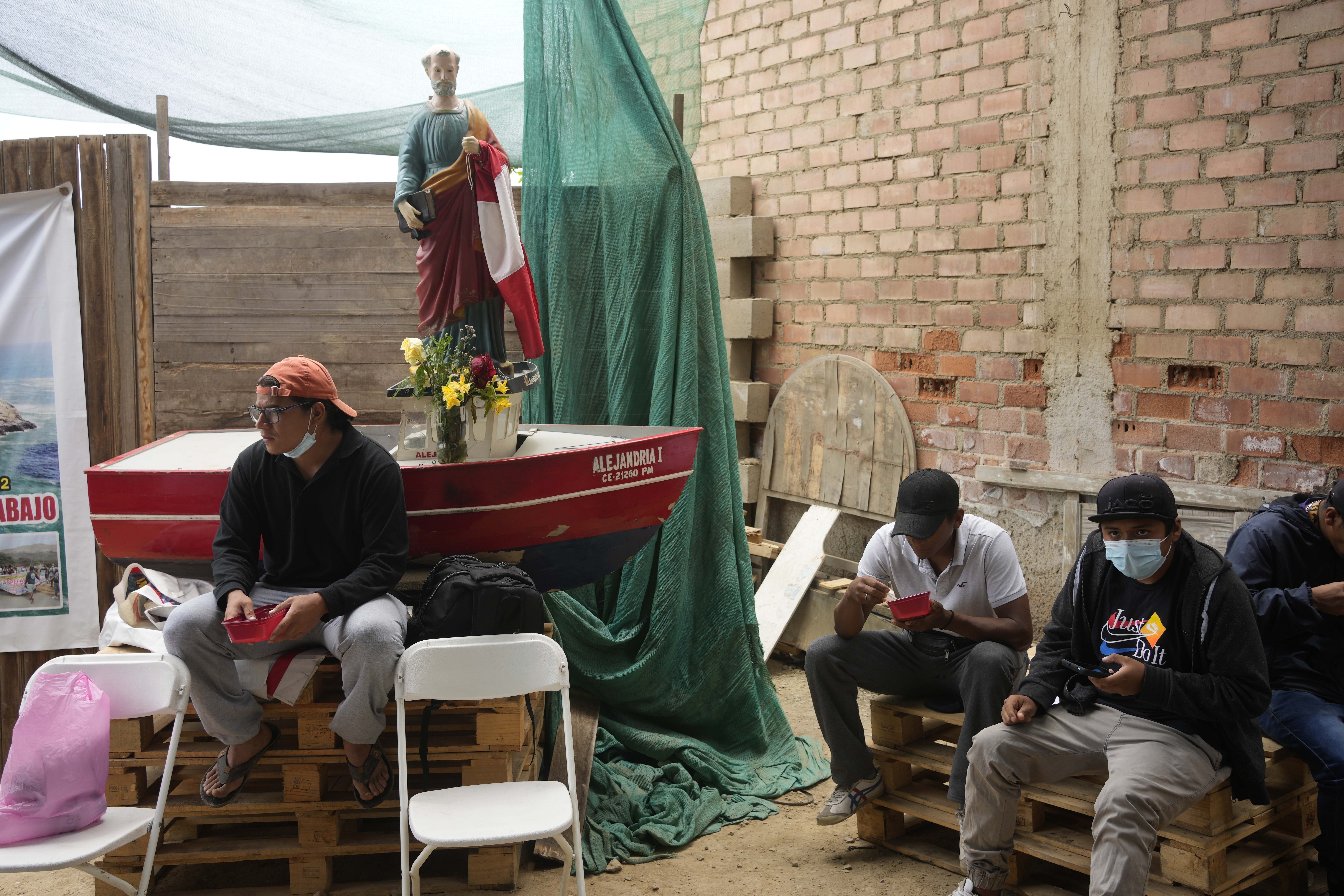 Fishermen eating