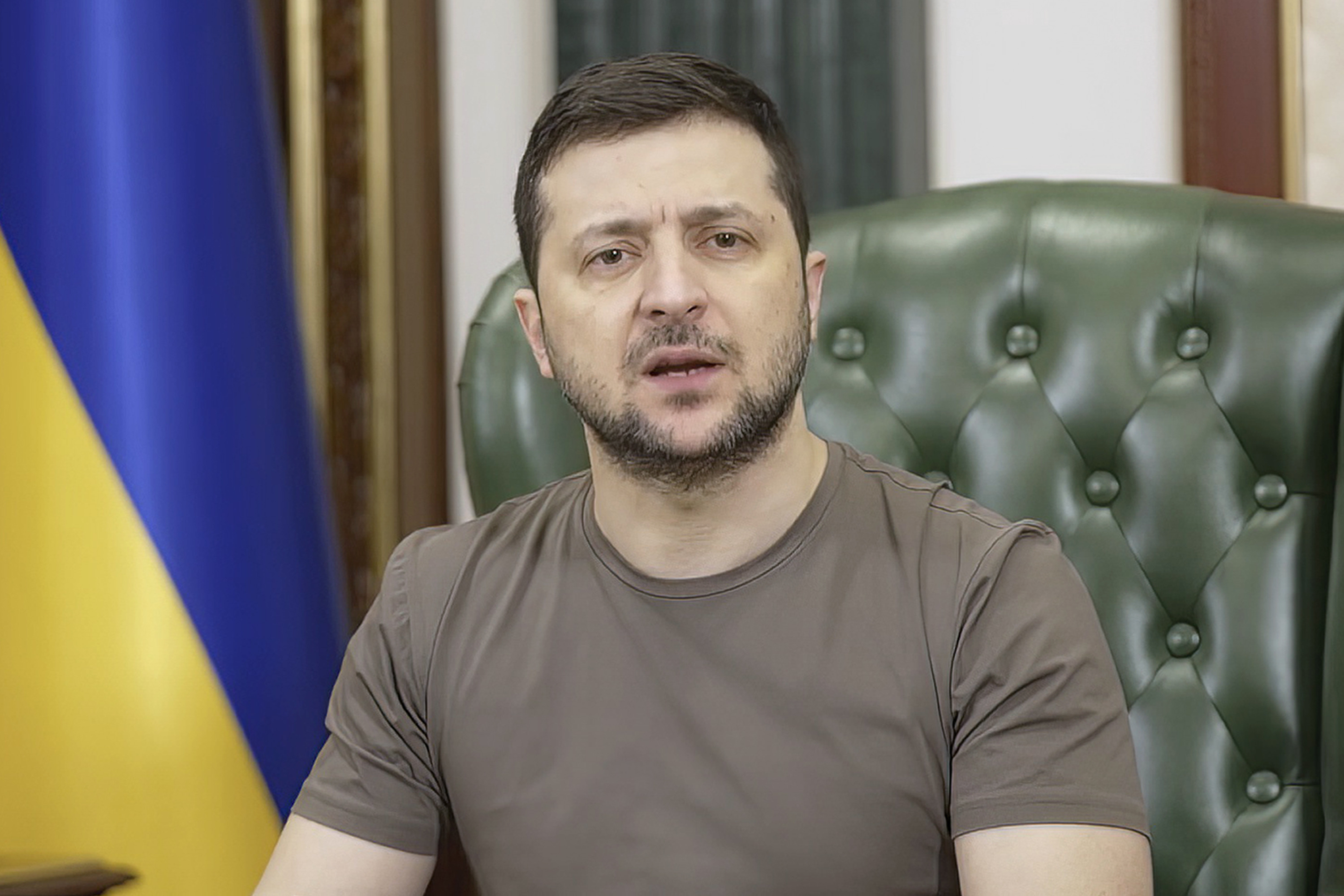 In this image from video provided by the Ukrainian Presidential Press Office and posted on Facebook early Tuesday, March 15, 2022, Ukrainian President Volodymyr Zelenskyy speaks in Kyiv, Ukraine