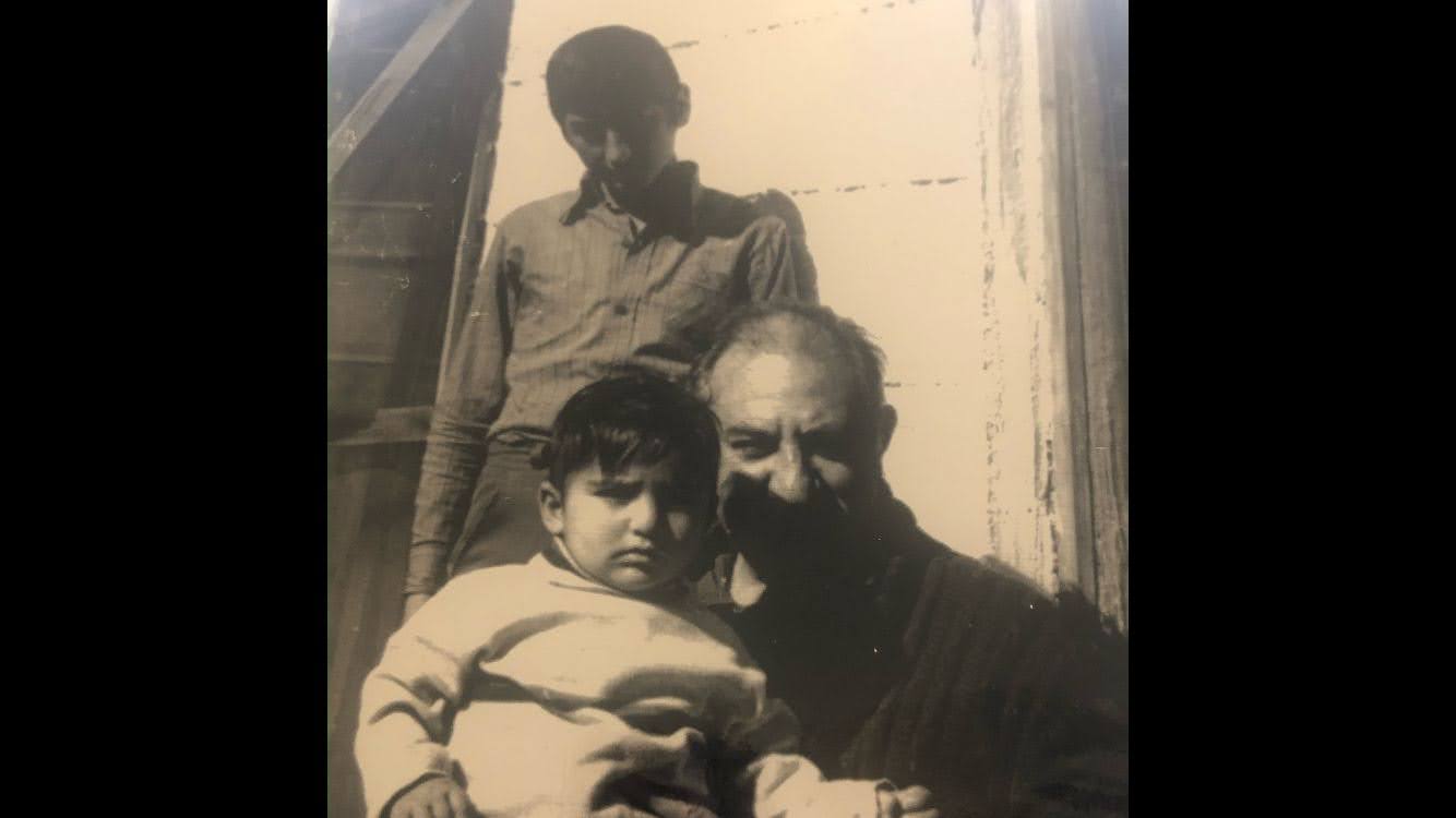 Zahra Nawroz, pictured here at age 2 alongside her grandfather and uncle in Afghanistan, and her family left the country in 1990 and eventually resettled in the United States [Photo courtesy of Zahra Nawroz]