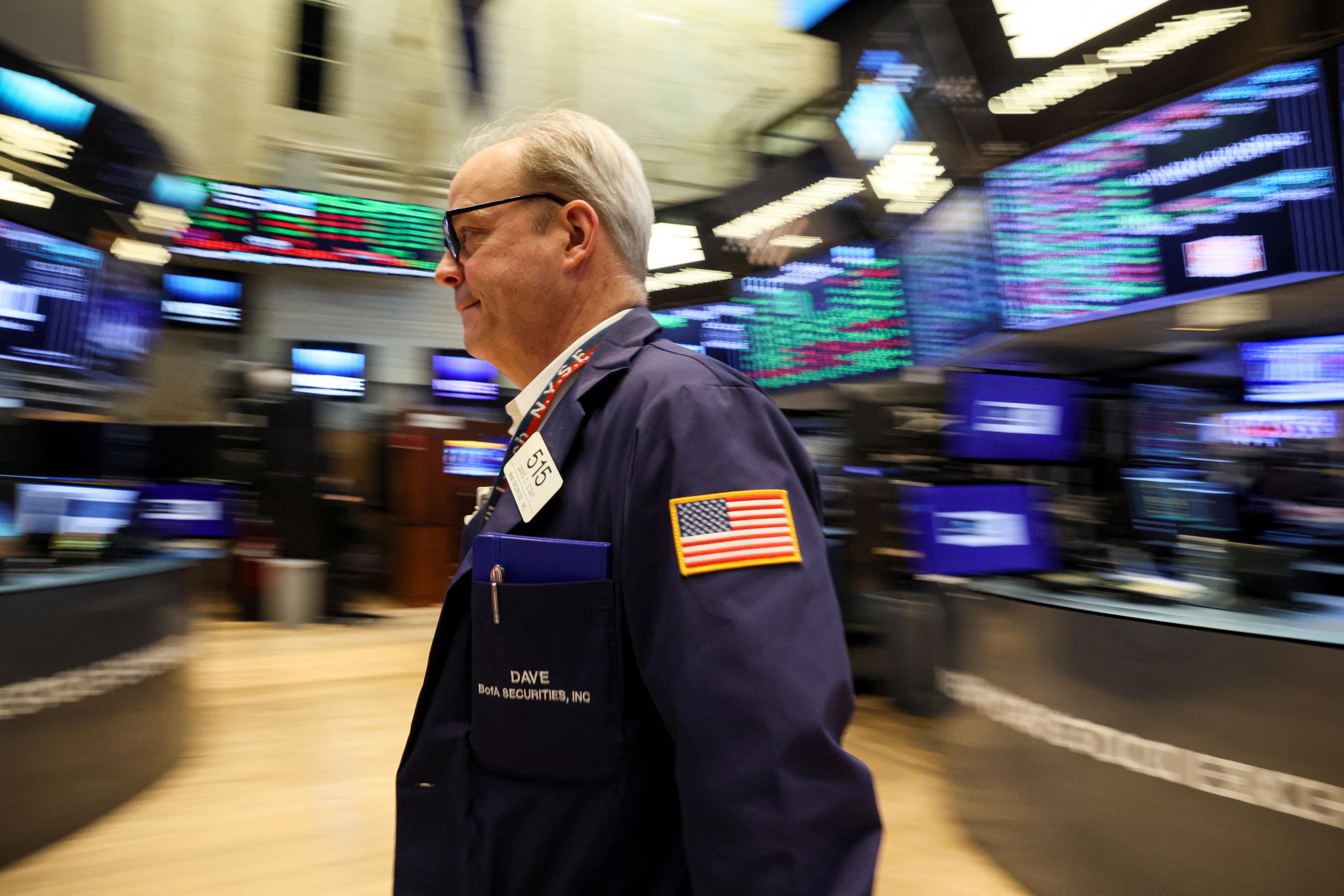 Traders work on the floor of the New York Stock Exchange (NYSE) in New York City, New York, U.S.