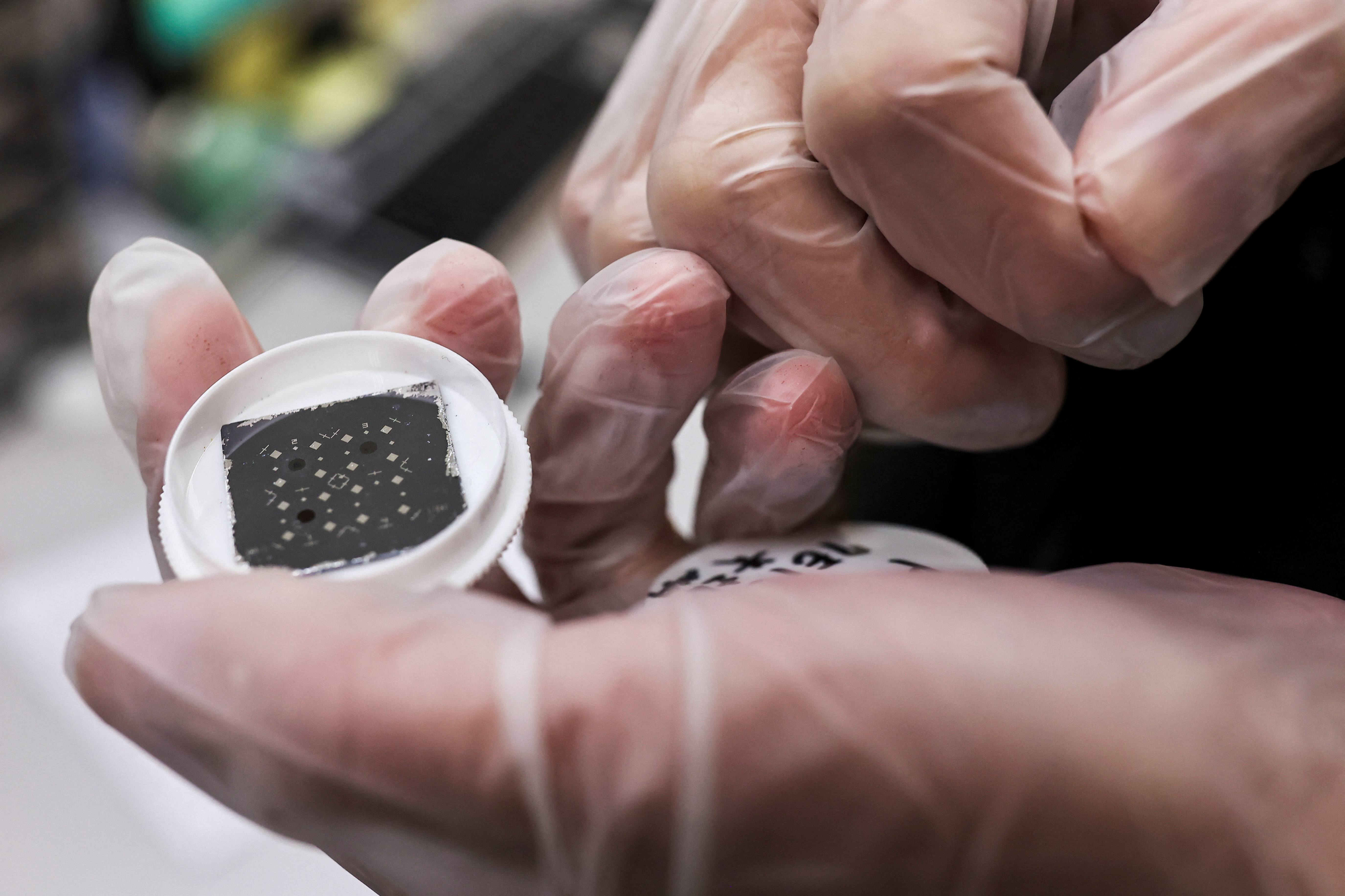 Person holds semiconductor in Taiwan