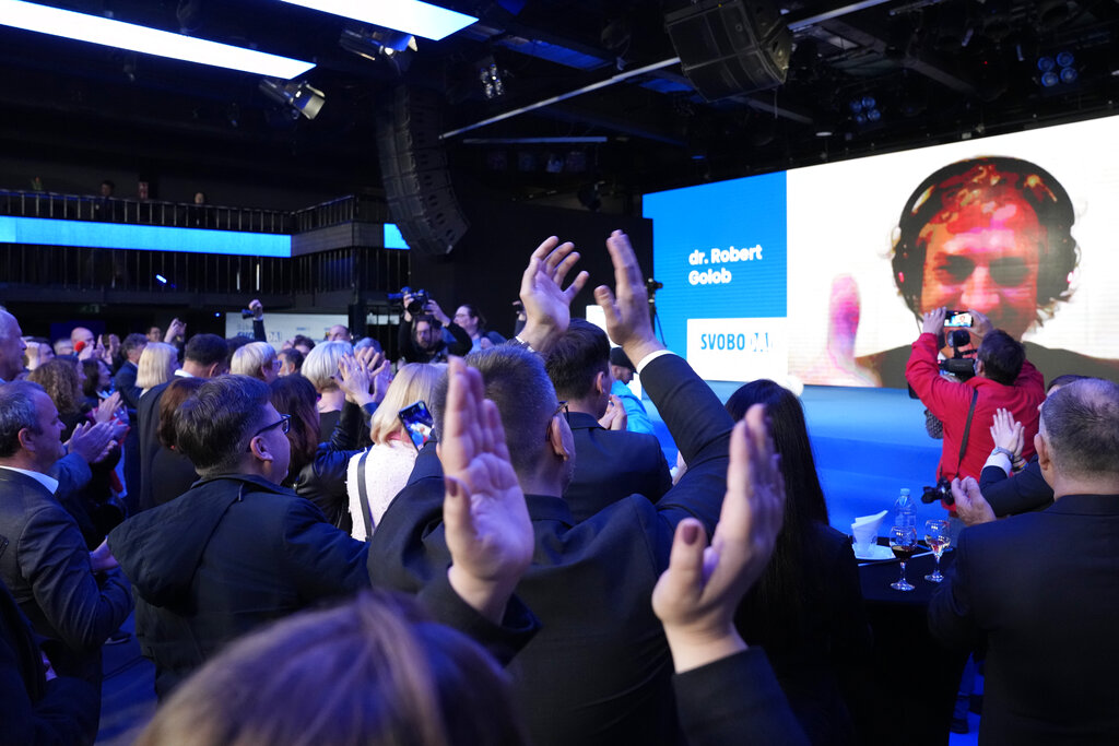 Slovenian opposition leader Robert Golob addresses members
