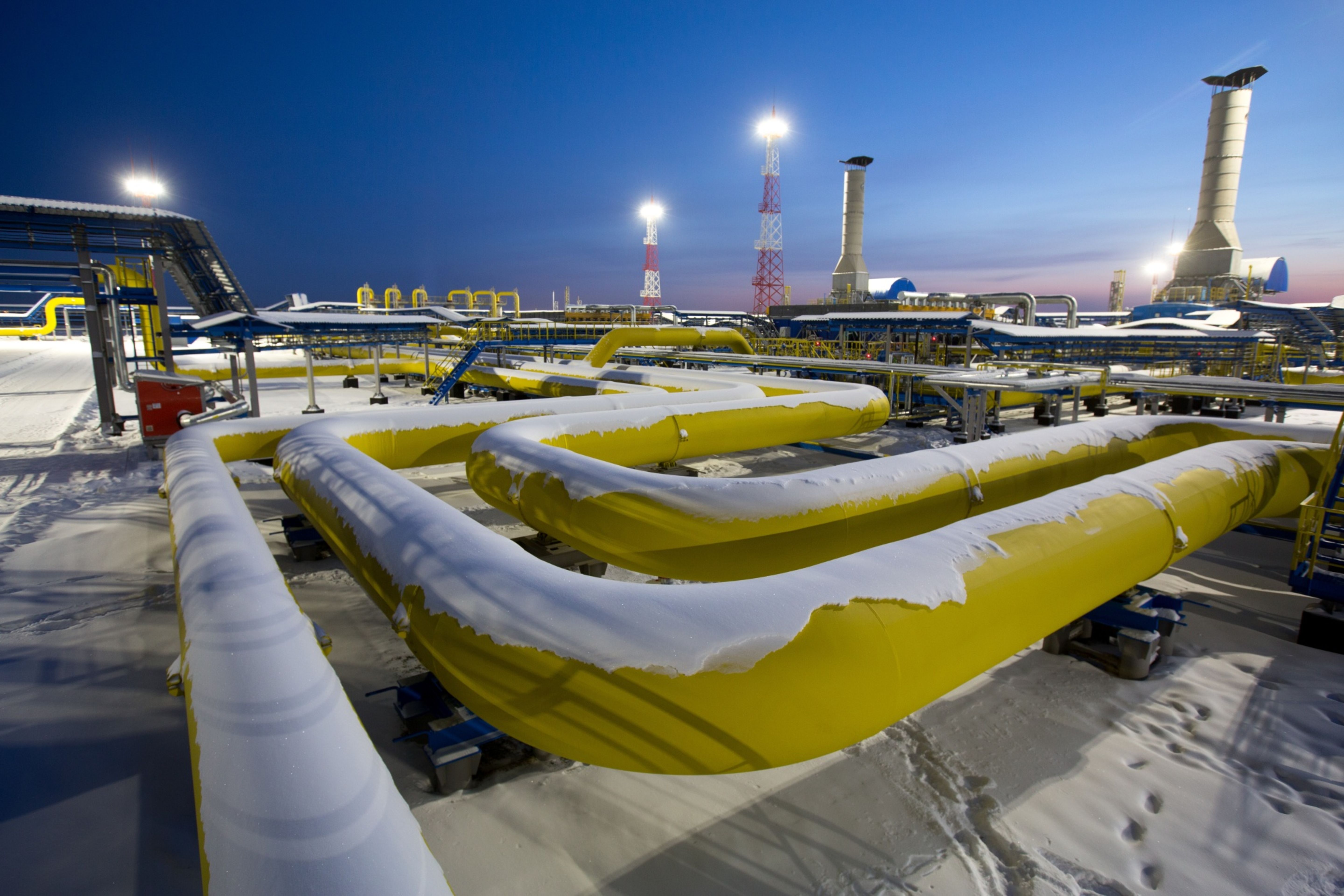 Snow covers sections of connected pipework in Russia.
