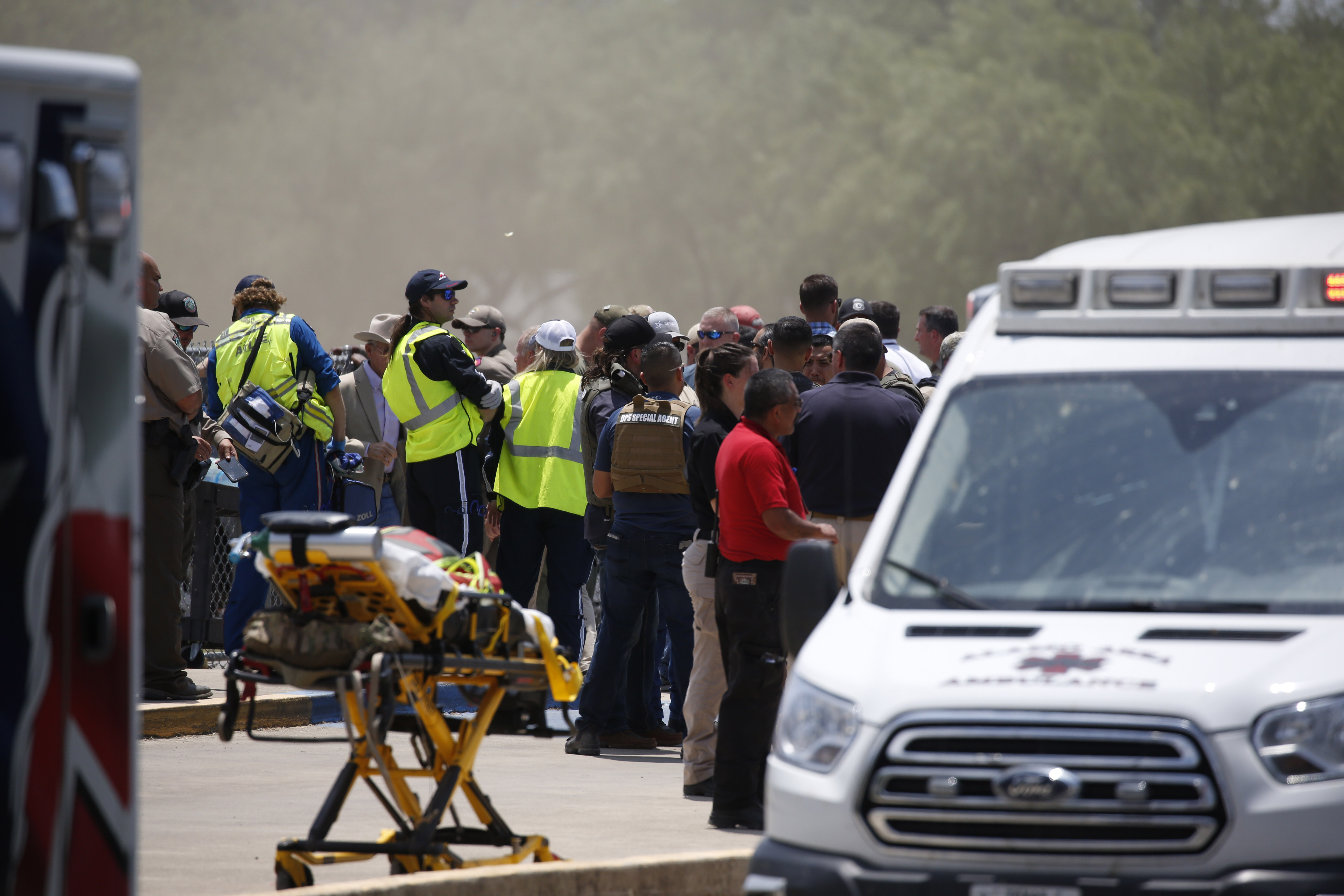Emergency personnel gather near Robb Elementary School following a shooting