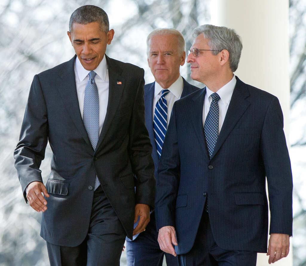 Federal appeals court judge Merrick Garland arrives with President Barack Obama and Vice President Joe Biden to be introduced as Obamas nominee for the Supreme Court, during an announcement in the Rose Garden of the White House, in Washington in March 2016.