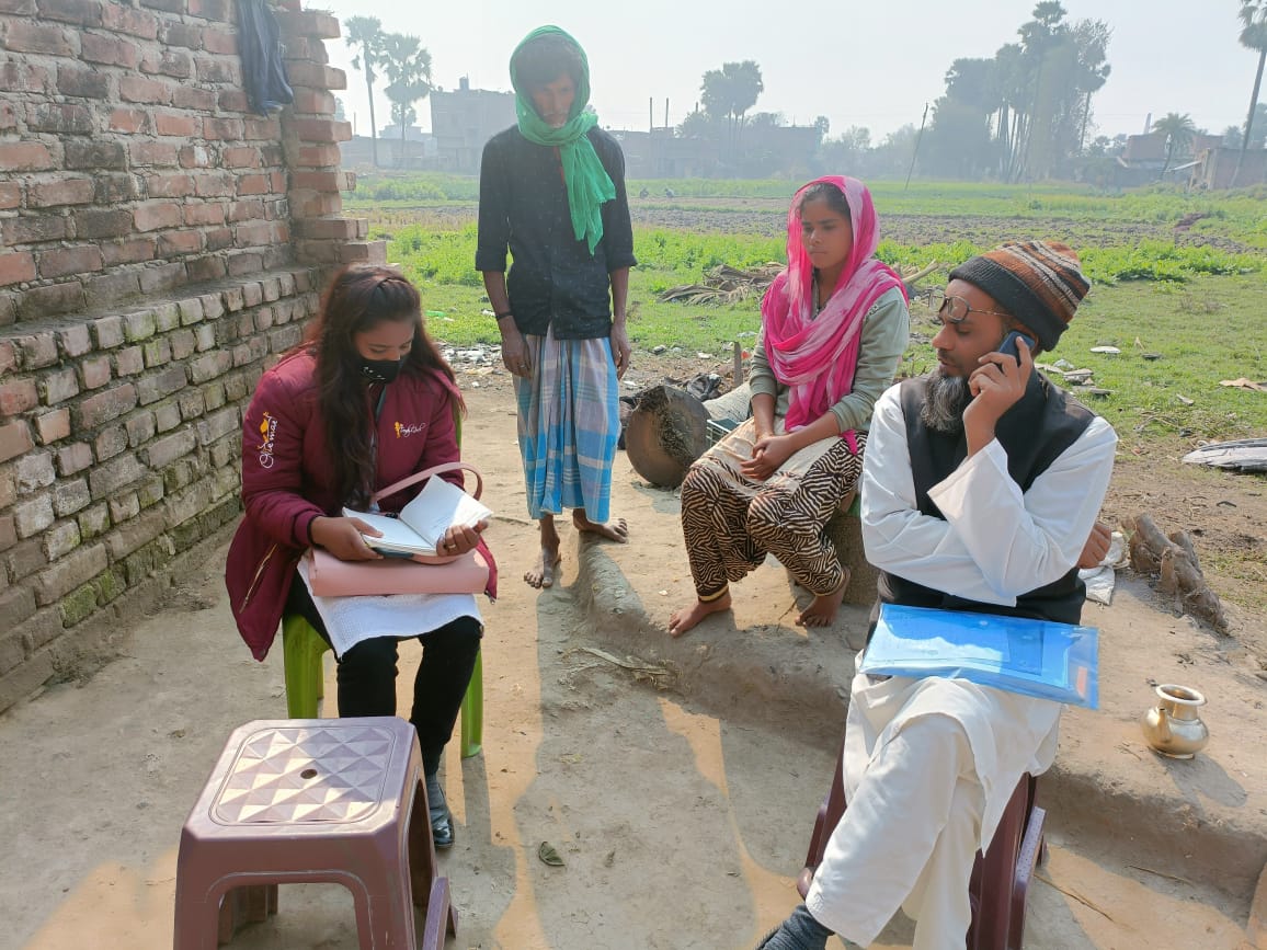 A DHRD member interviews people in Bihar state’s Nawada district [Courtesy: Ranju Kumari]