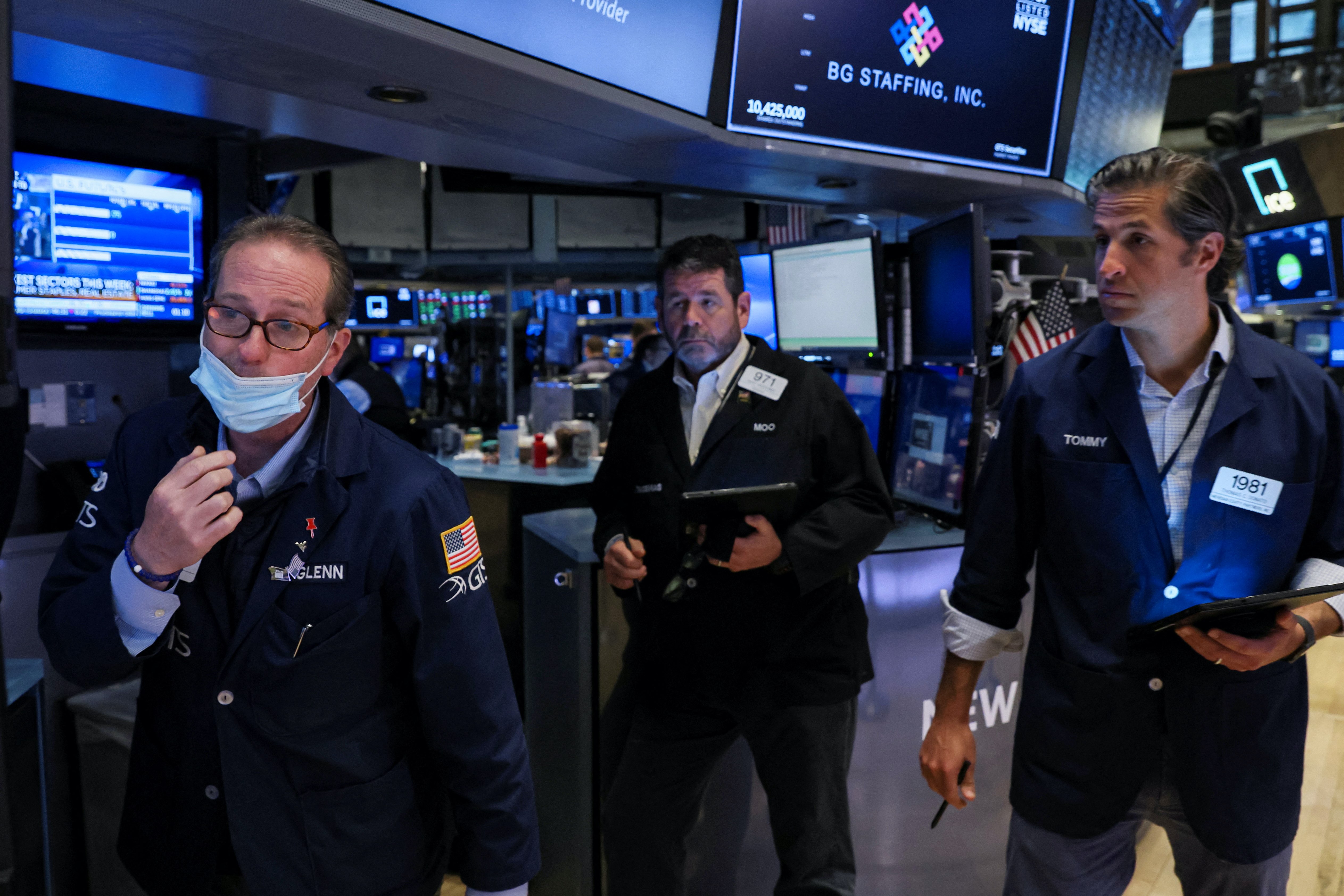 Traders work on the floor of the New York Stock Exchange (NYSE) in New York City