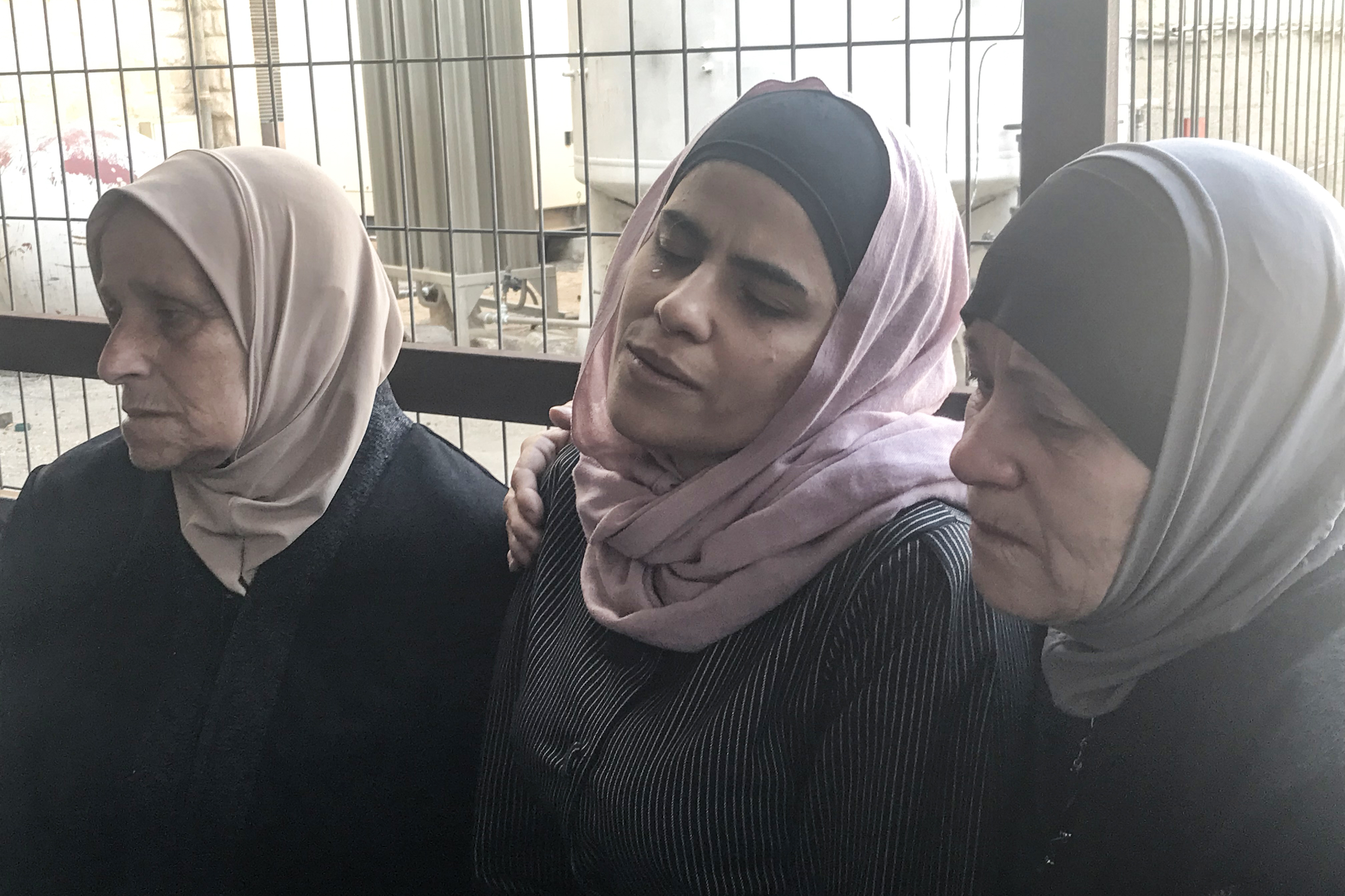 Yamin’s mother mourns her dead son at the Rafidia hospital in Nablus, occupied West Bank on May 25, 2022 [Al Jazeera]