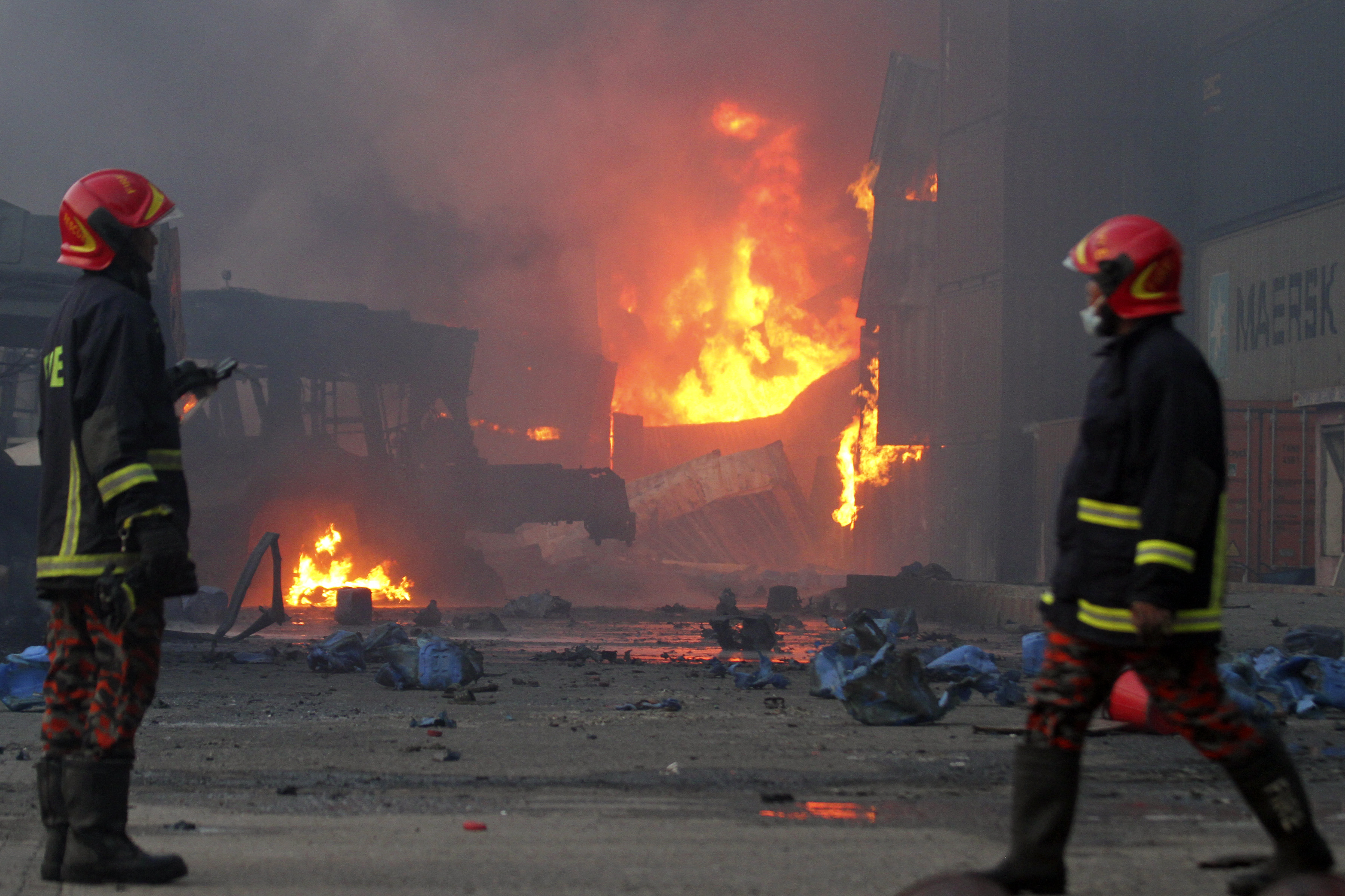 Firefighters arrive at the site after a fire broke out