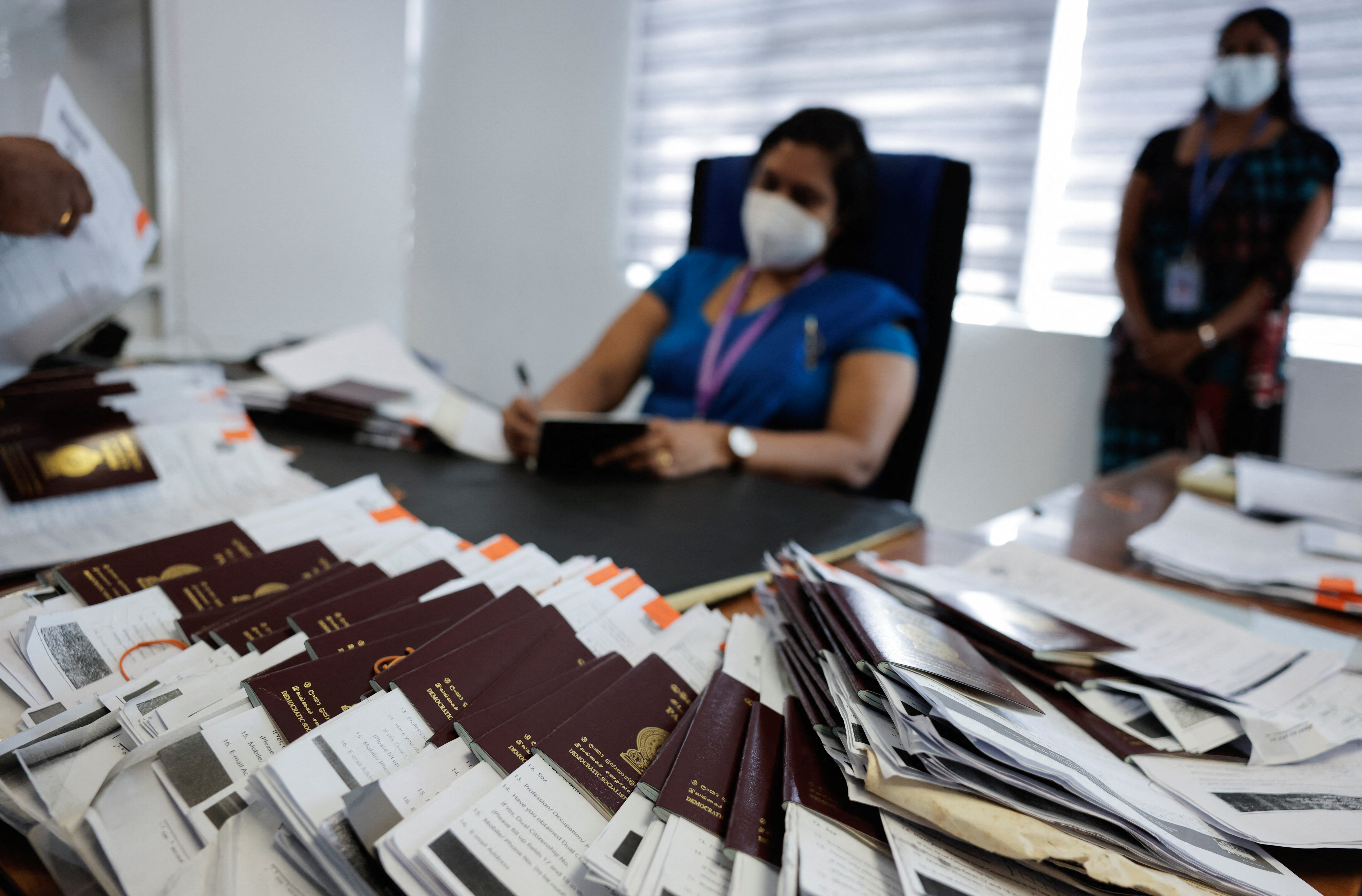 Officials prepare the passports
