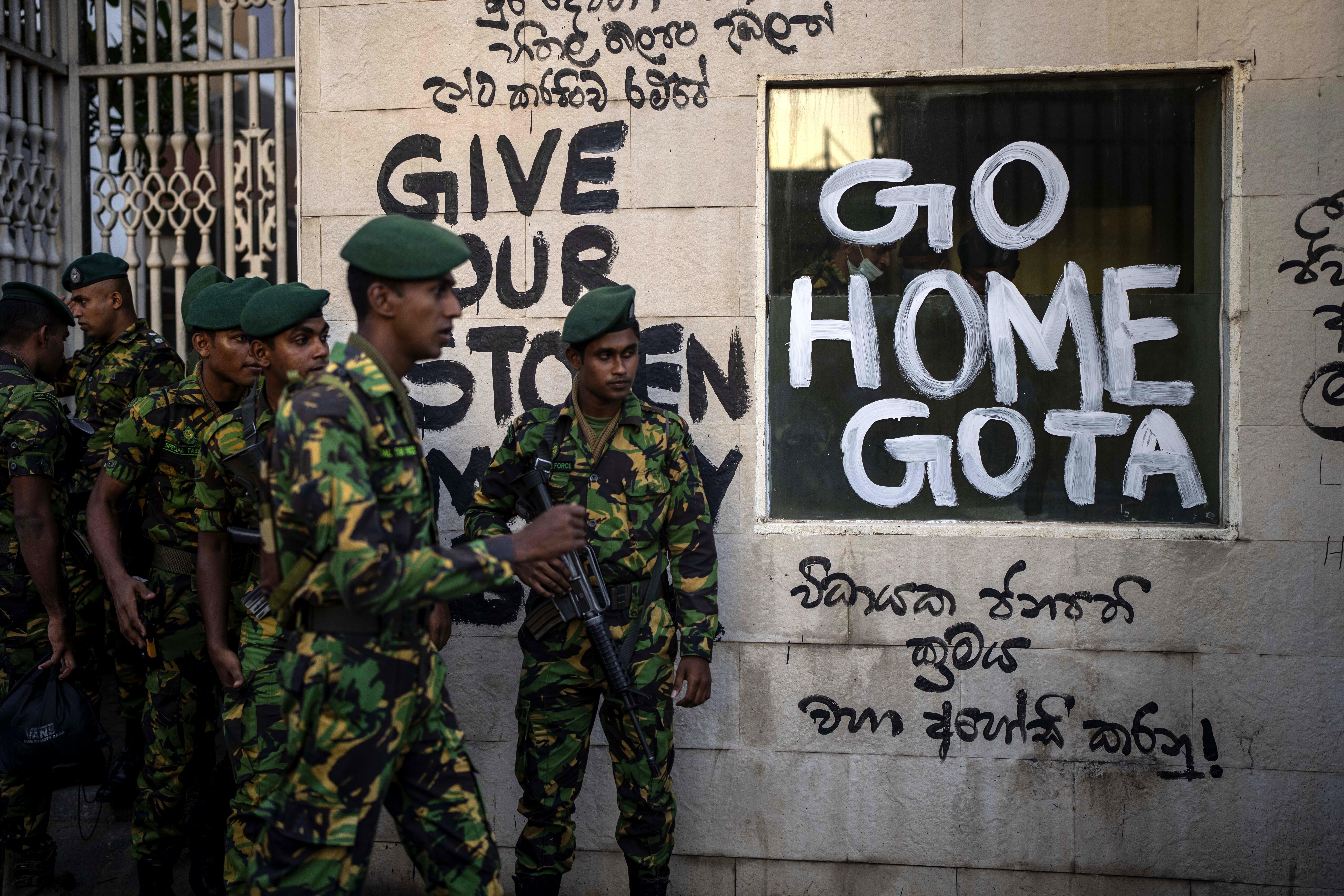 Sri Lankan soldiers patrol near the official residence of President Gotabaya Rajapaksa after it was stormed by anti-government protesters in Colombo