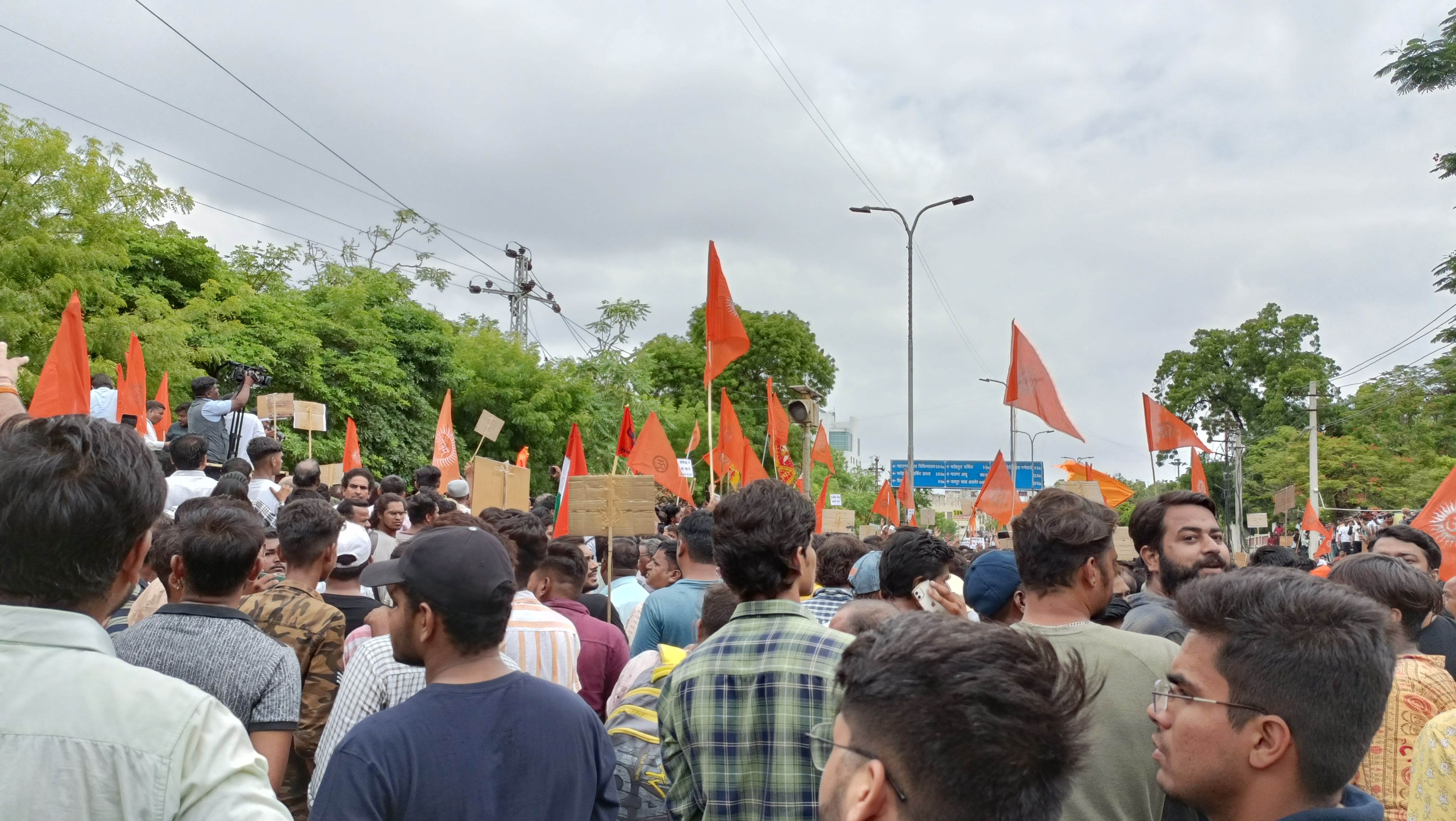 Hindus marching with saffron flags over the murder in Udaipur