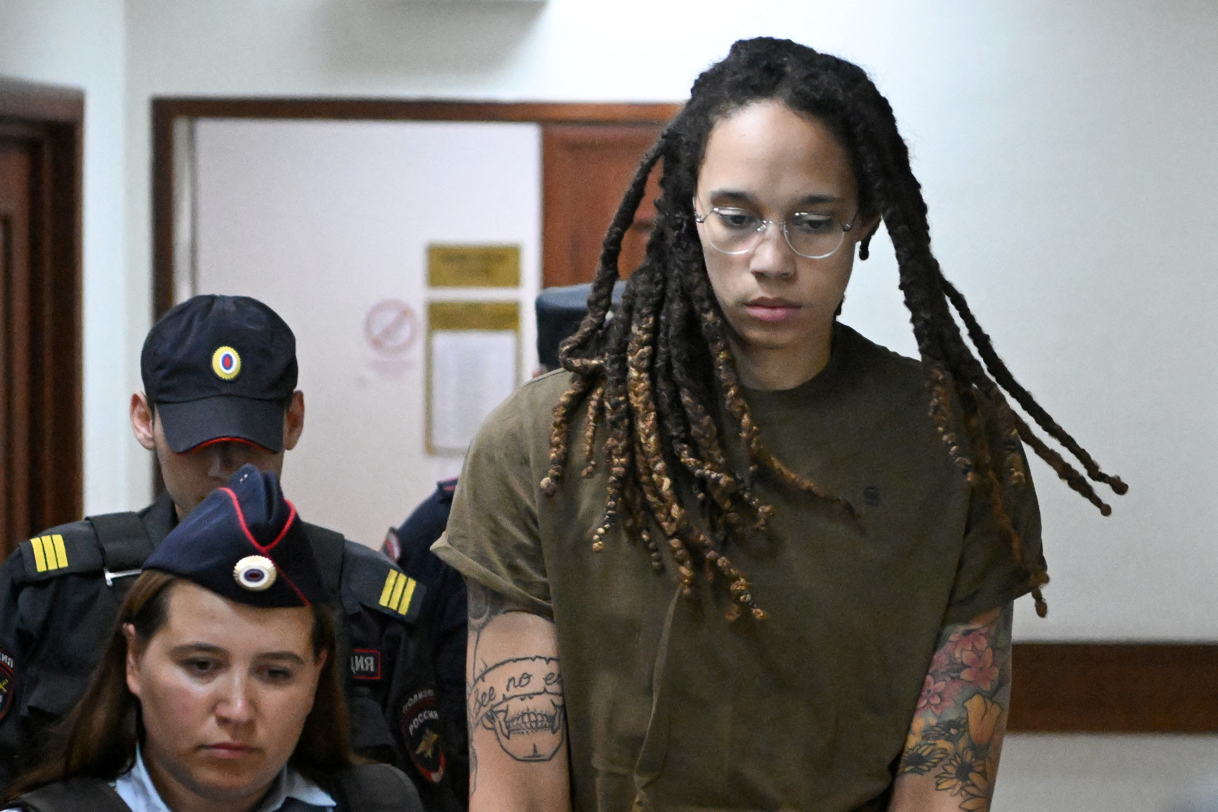 Brittney Griner led into courtroom