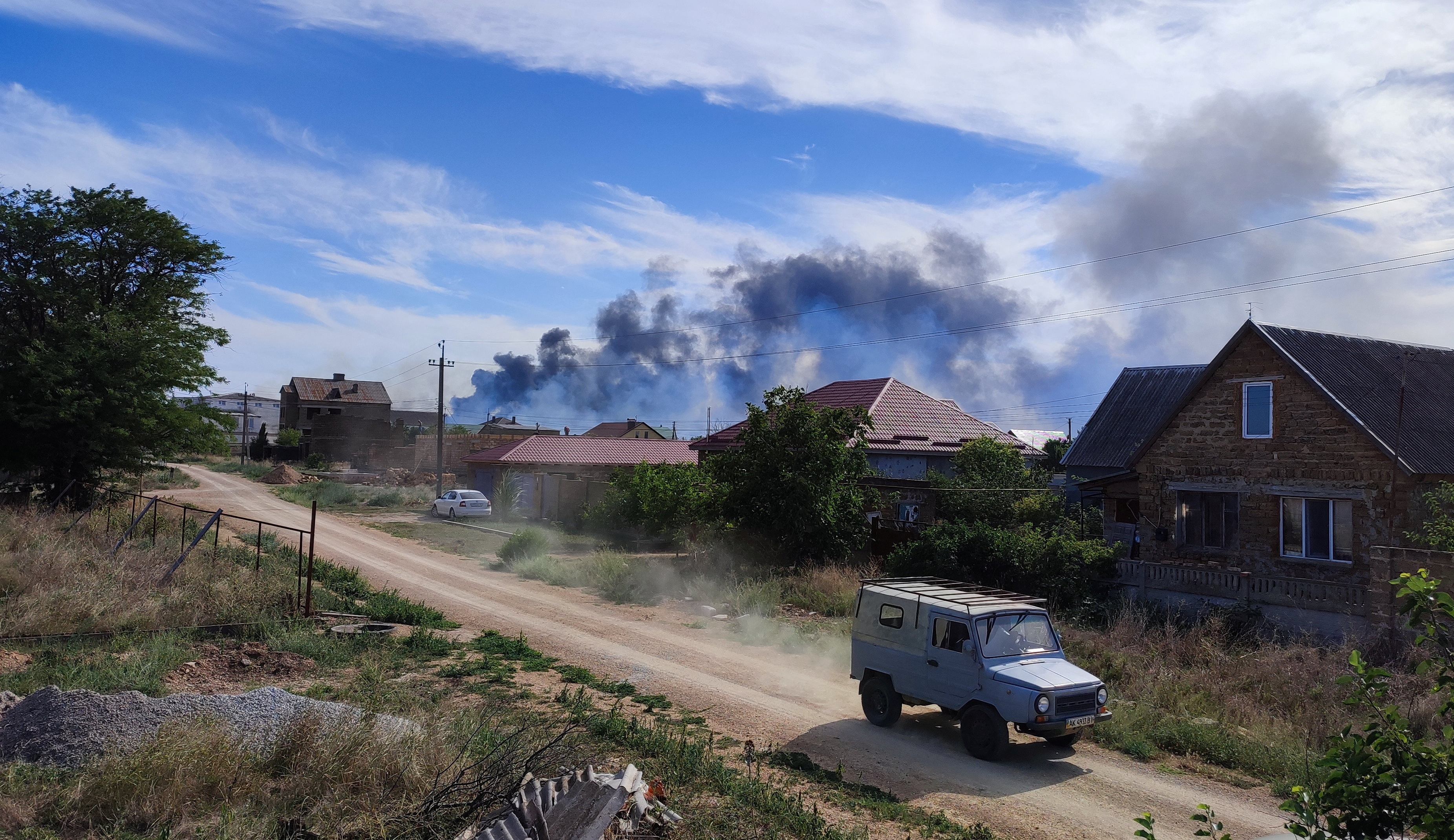 smoke rises after an explosion
