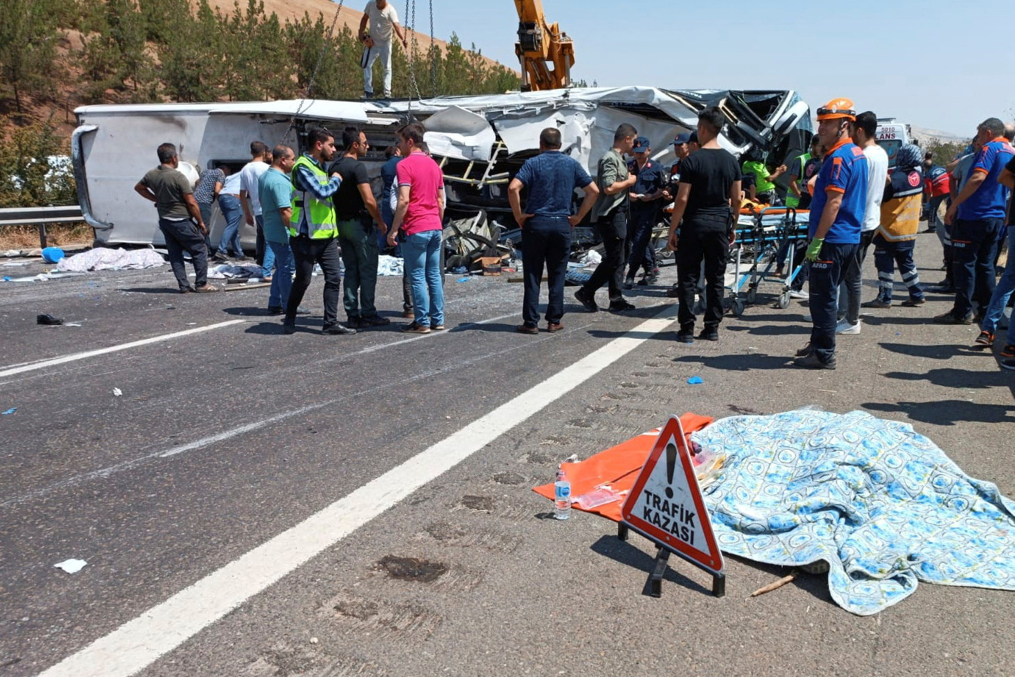 Rescue workers attend scene of bus crash