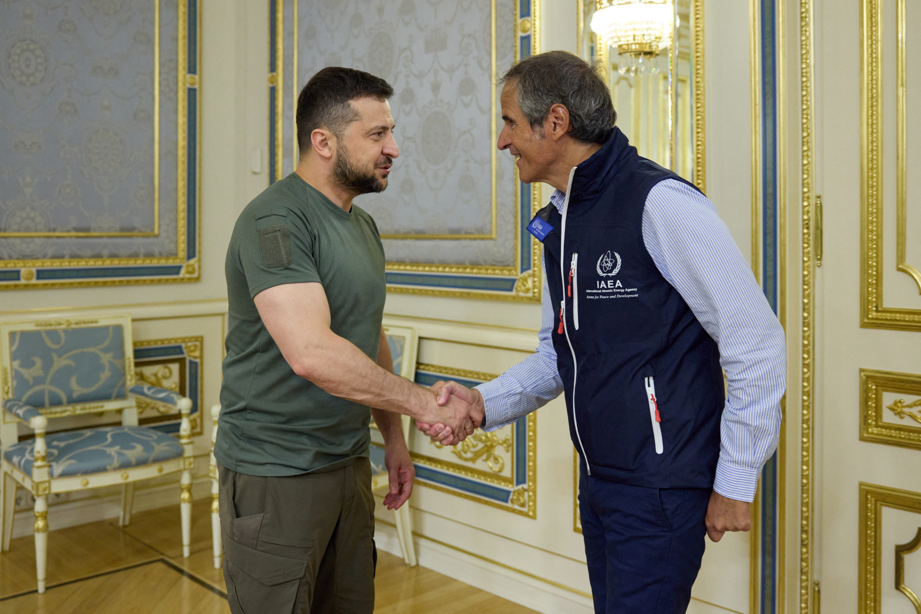 Ukraine's President Volodymyr Zelenskyy shakes hands with International Atomic Energy Agency (IAEA) Director General Rafael Mariano Grossi in Kyiv, Ukraine.