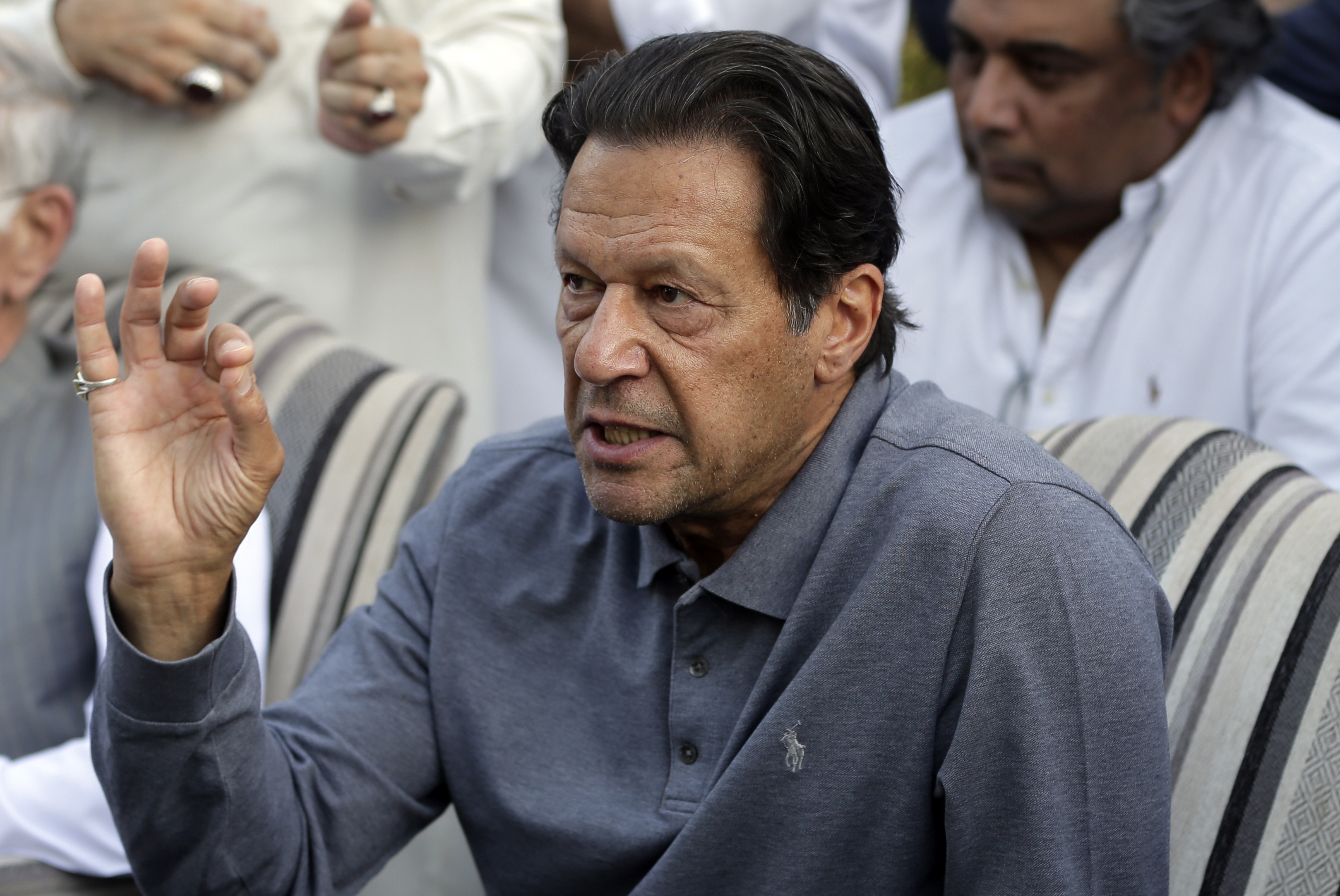 Khan speaks during a news conference in Islamabad