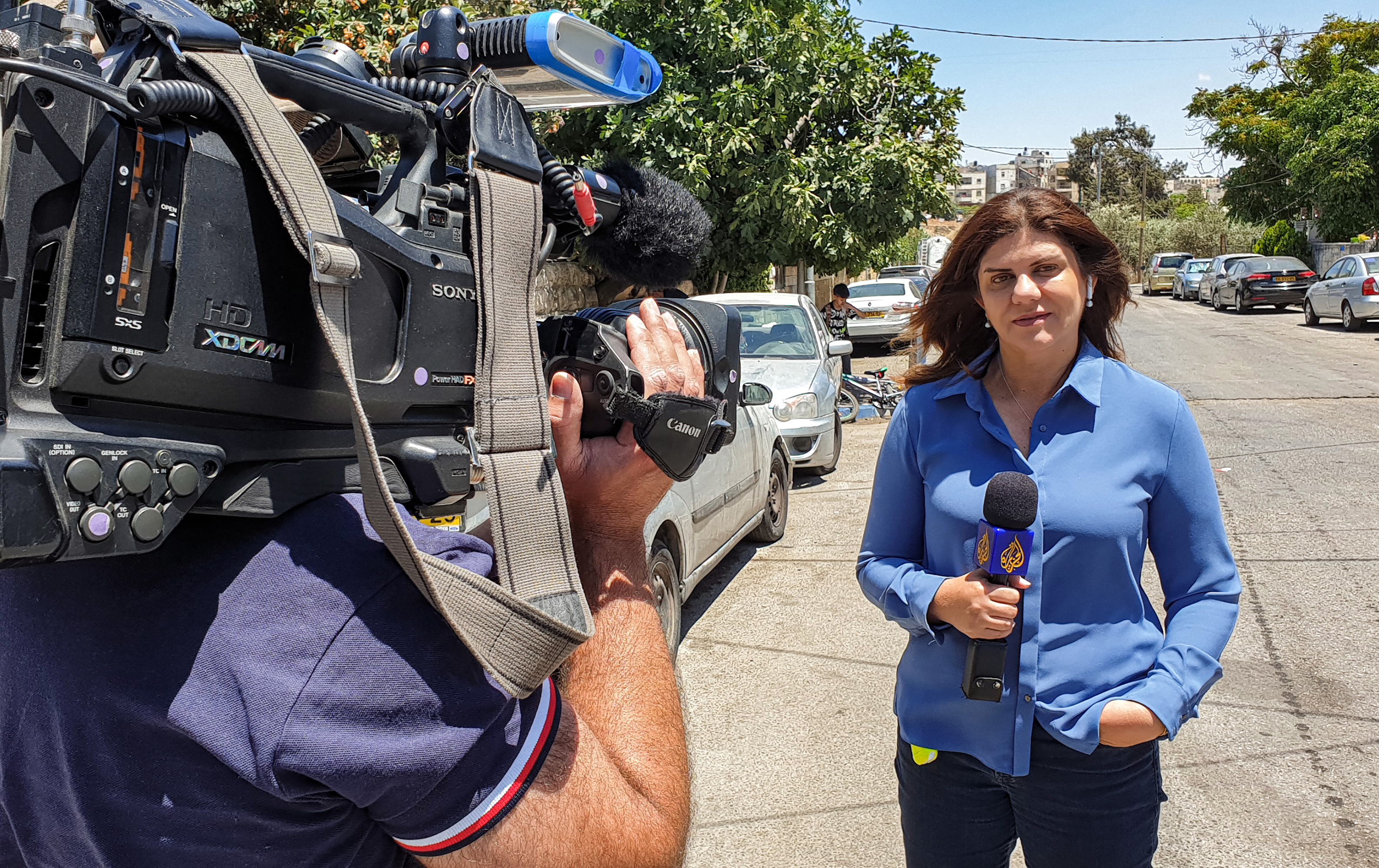 Veteran Al Jazeera TV journalist Shireen Abu Akleh reporting from Jerusalem on May 22, 2021