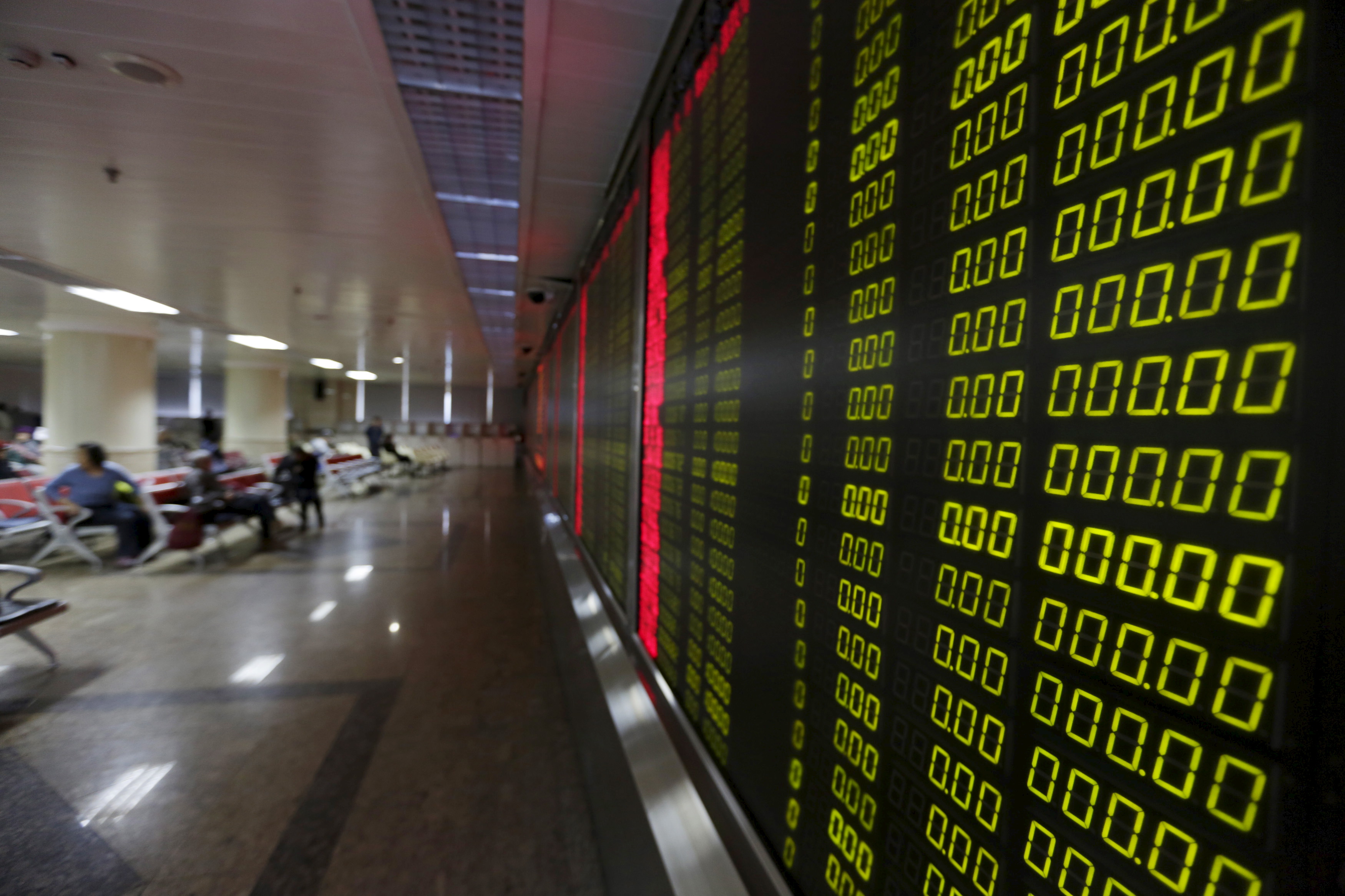 China stock quotes on a large screen.