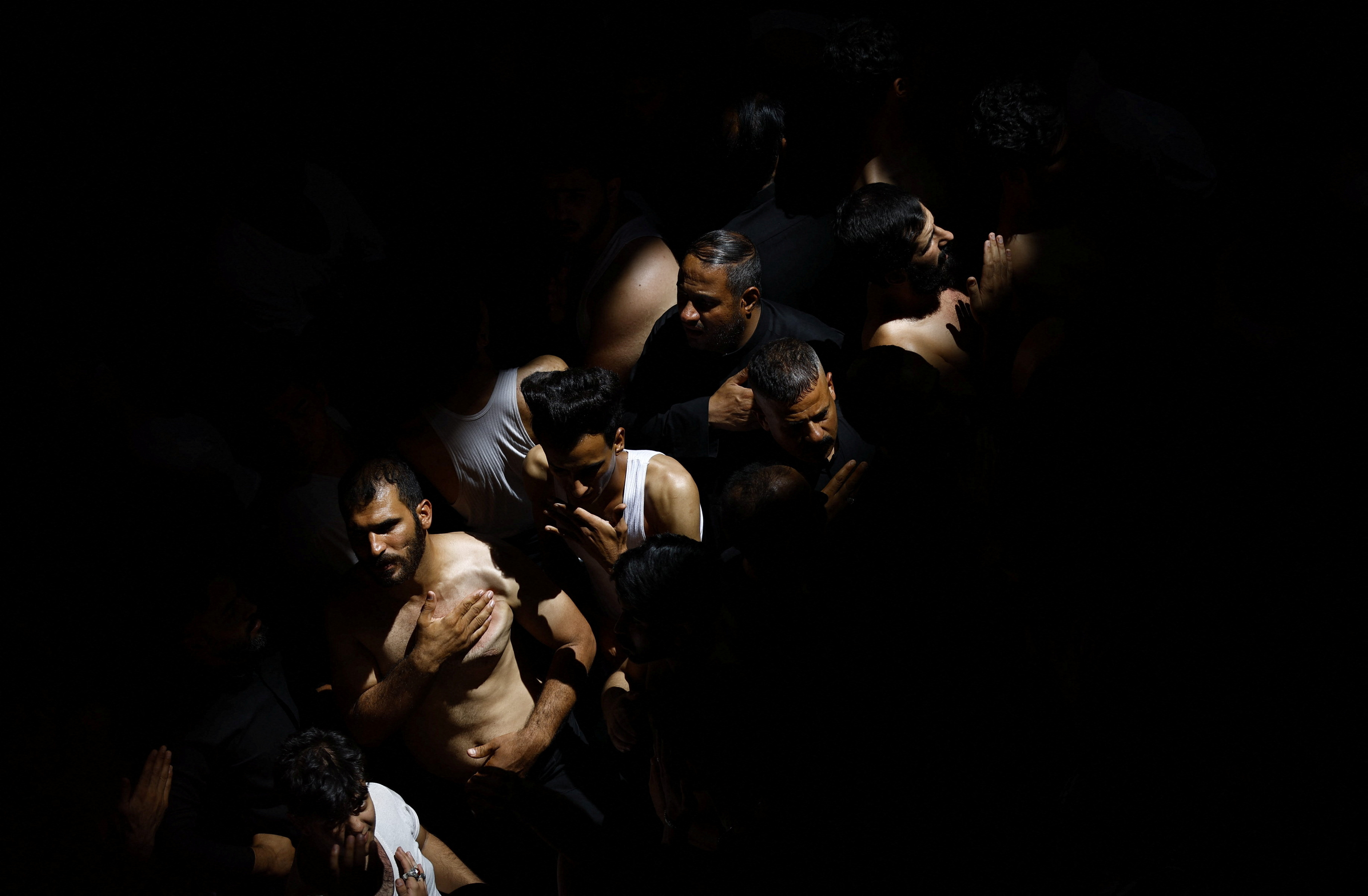 Shia Muslim pilgrims take part in a mourning ceremony during Arbaeen in Iraq.