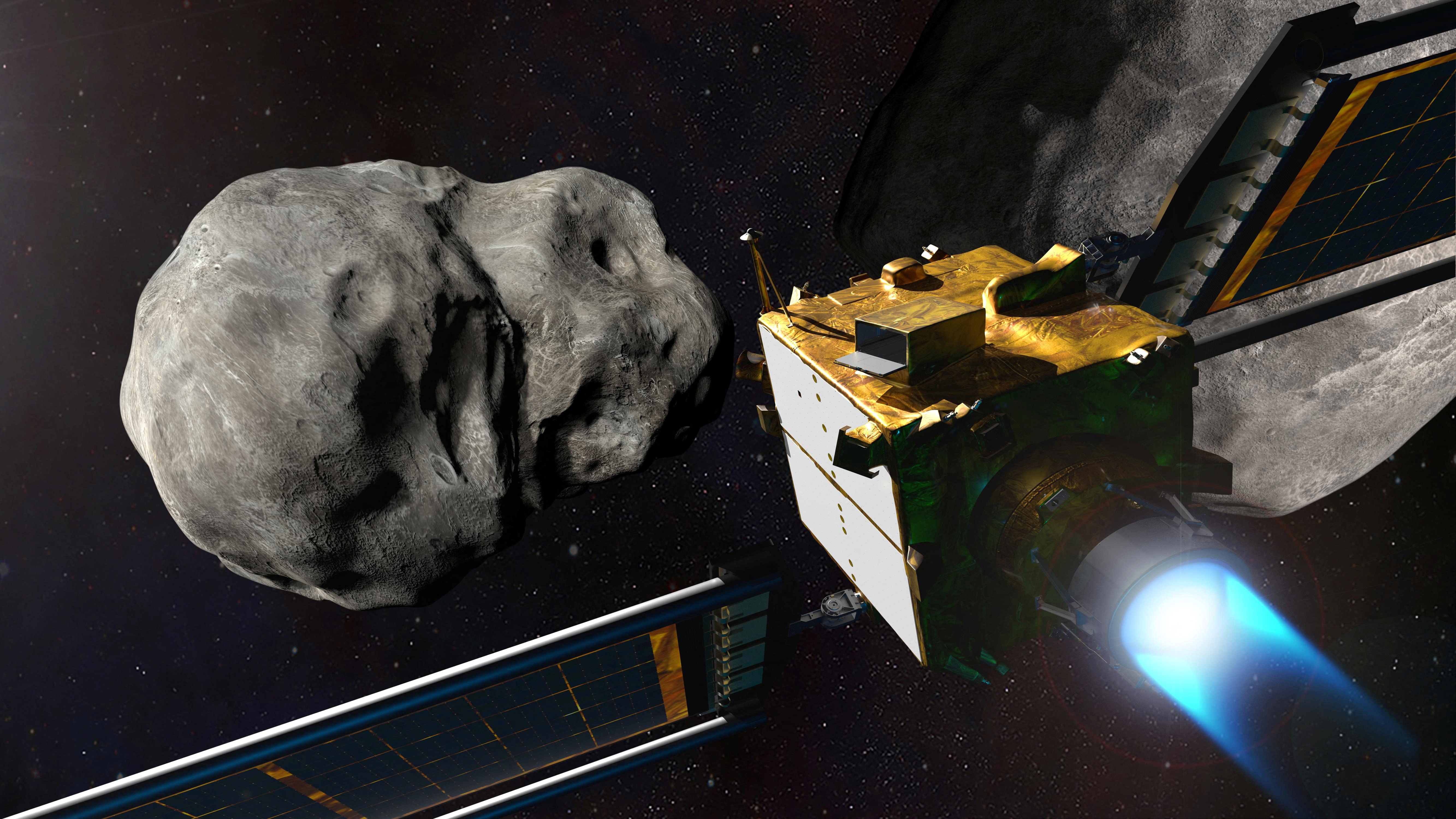 An illustration of NASA's Double Asteroid Redirection Test (DART) spacecraft with blue flames behind it shortly before crashing into the Didymos binary asteroid system