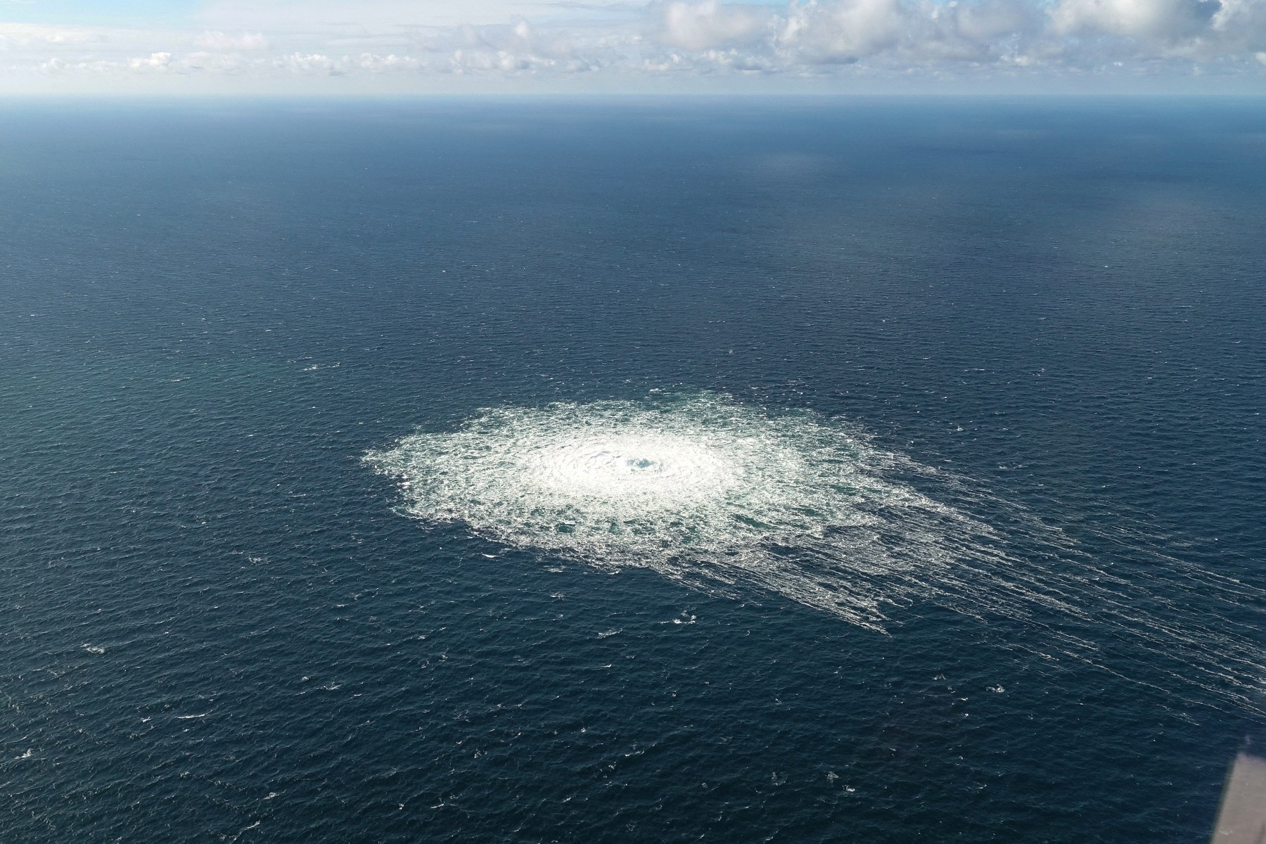 Gas leak at Nord Stream 2 as seen from the Danish F-16 interceptor on Bornholm, Denmark September 27, 2022. Danish Defence Command/Forsvaret Ritzau Scanpix/via REUTERS ATTENTION EDITORS - THIS IMAGE WAS PROVIDED BY A THIRD PARTY. DENMARK OUT. NO COMMERCIAL OR EDITORIAL SALES IN DENMARK.