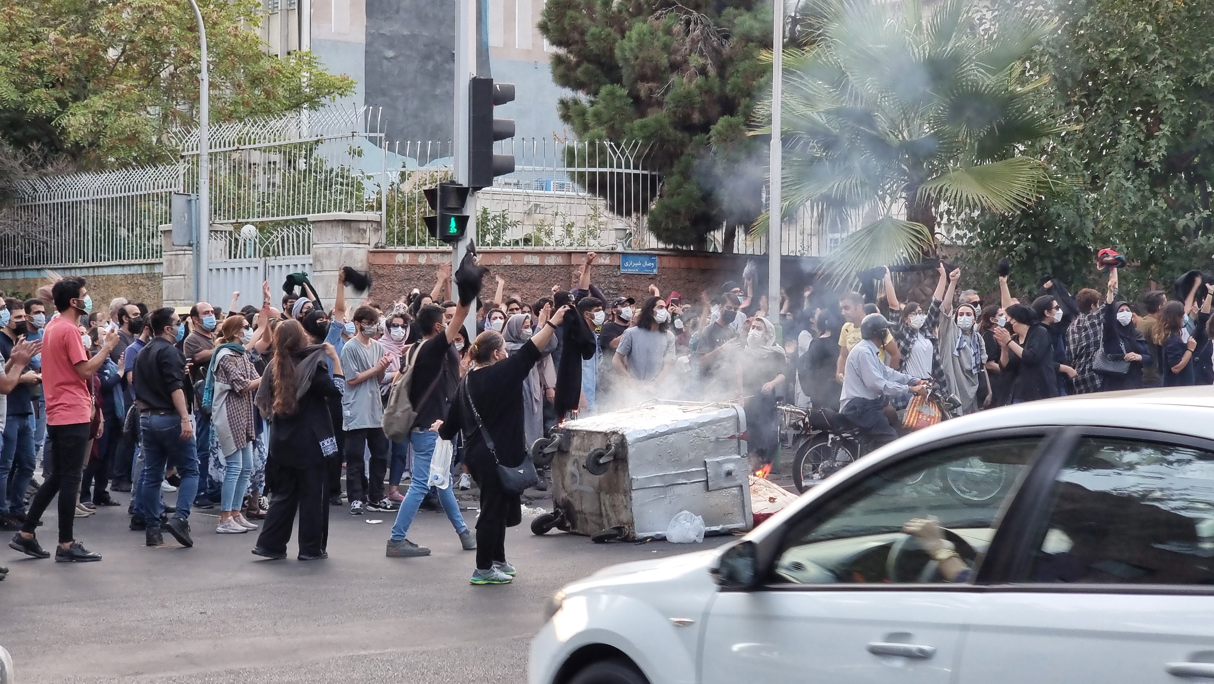 People gather in protest against the death of Mahsa Amini along the streets on September 19, 2022 in Tehran, Iran.
