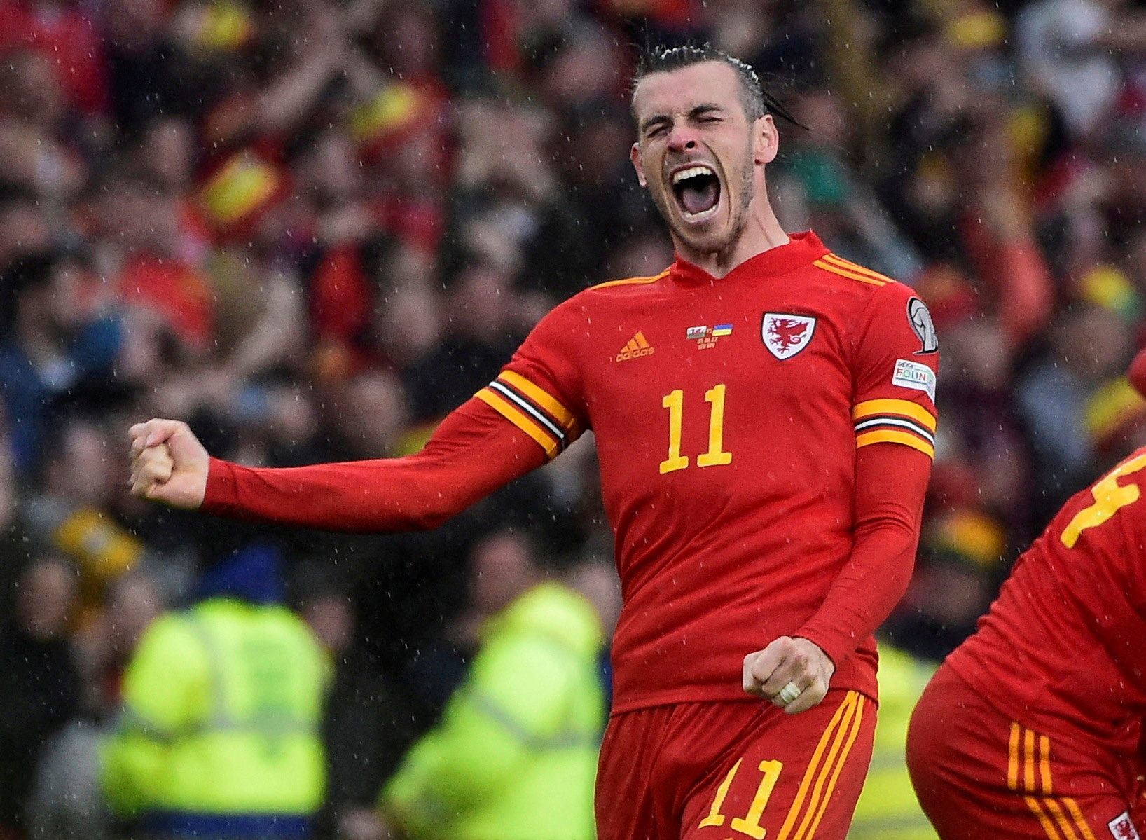 Gareth Bale celebrating after winning World Cup qualification