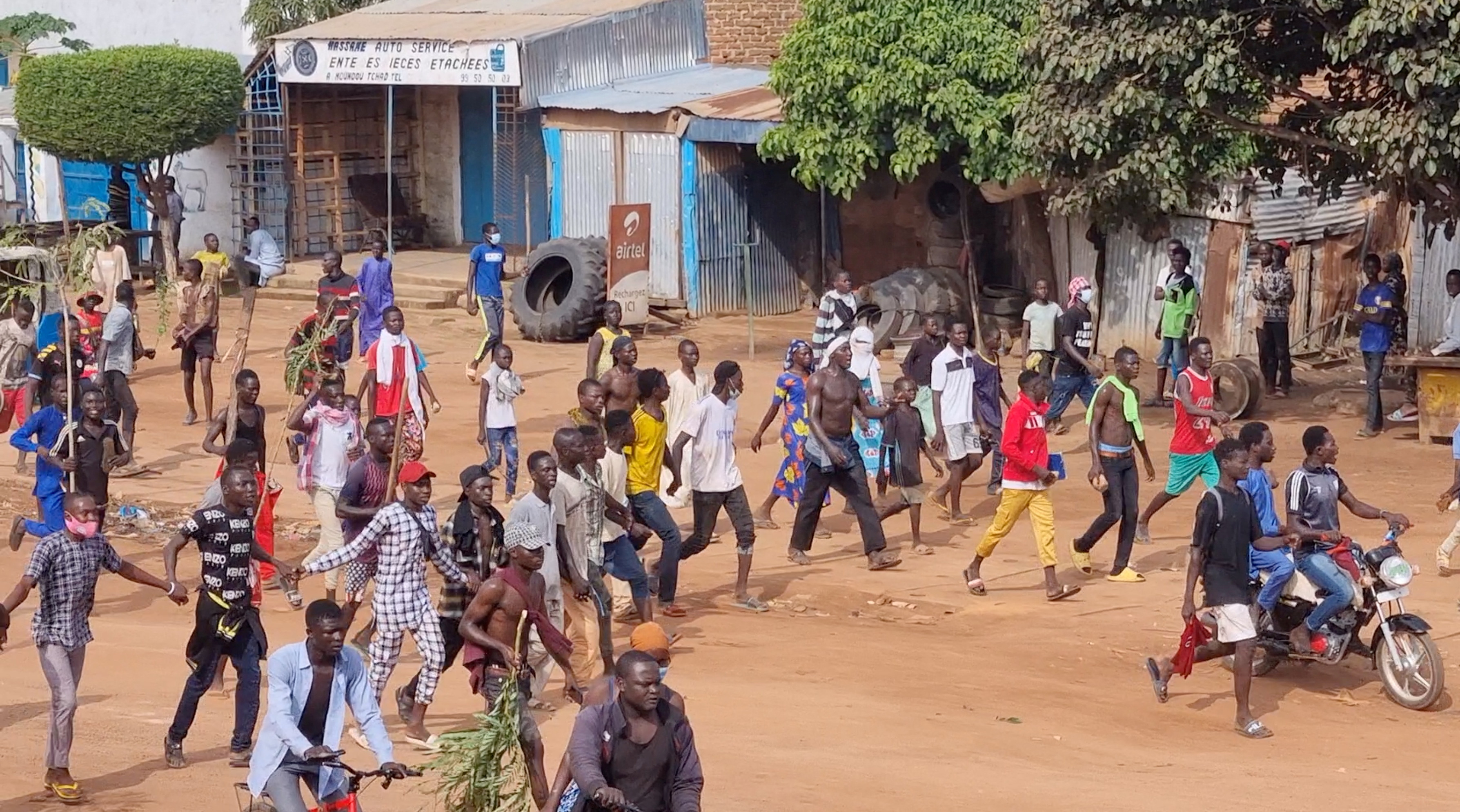 People walk as they protest in Moundou, Chad, October 20, 2022 in this picture obtained from social media. Hyacinthe Ndolenodji/via REUTERS THIS IMAGE HAS BEEN SUPPLIED BY A THIRD PARTY. MANDATORY CREDIT. NO RESALES. NO ARCHIVES.