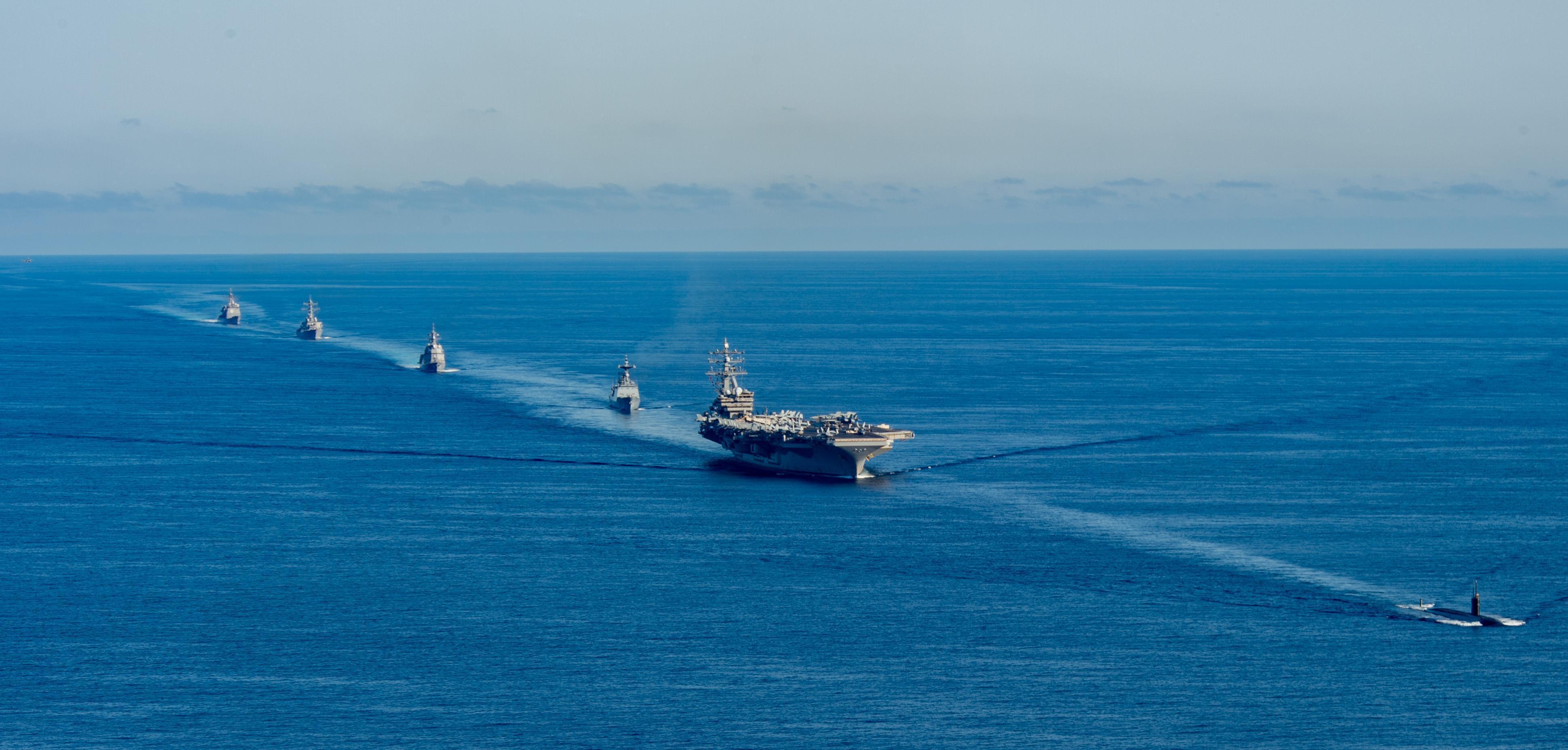 the USS Ronald Reagan aircraft carrier participates in a joint anti-submarine drill among South Korea, the United States and Japan in waters off South Korea's eastern coast in South Korea