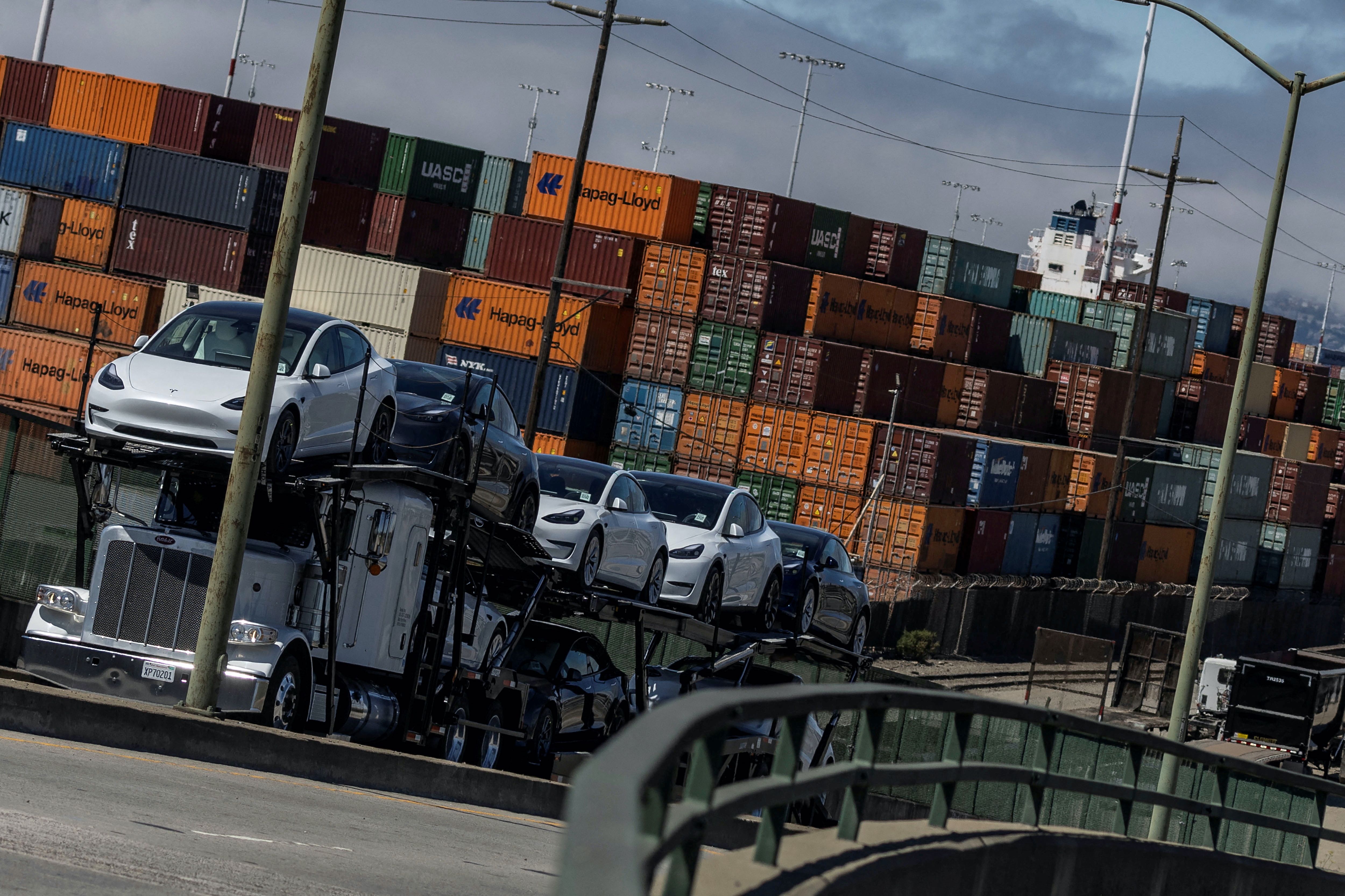 Shipping containers are seen at a terminal inside the Port of Oakland in Oakland, California, U.S