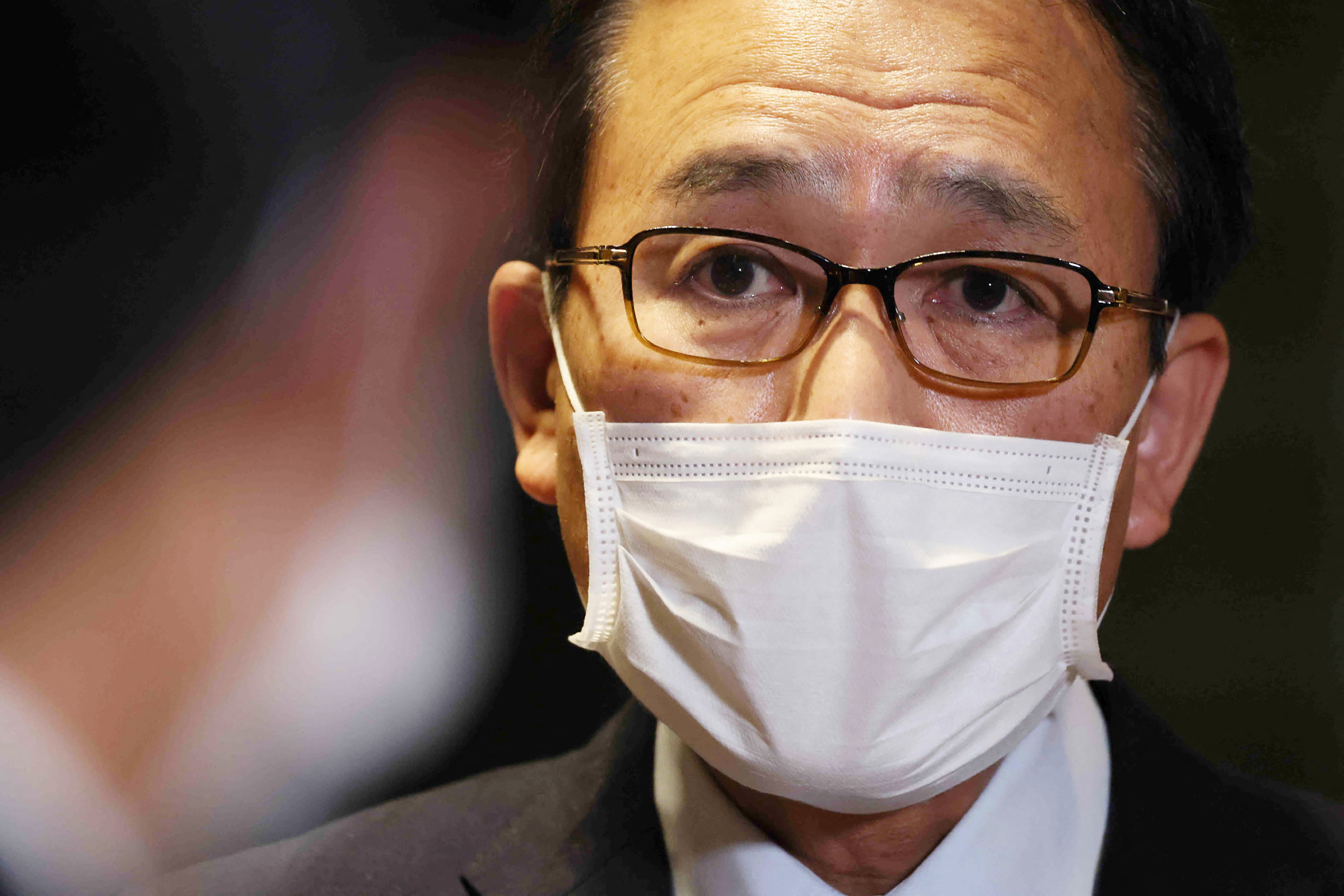 Close-up of Hanashi's face, wearing mask