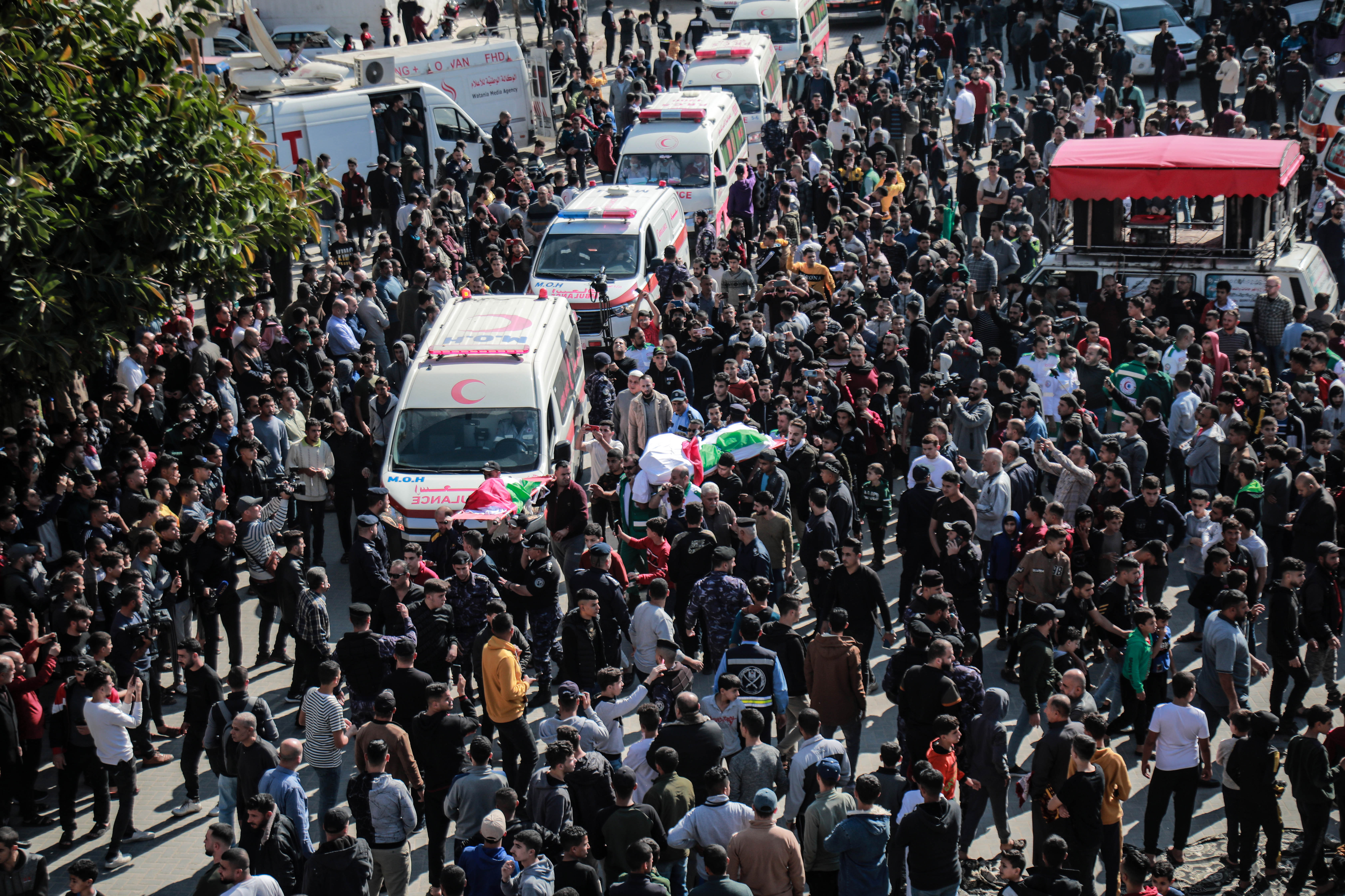 A mass funeral of the fire victims after Friday prayers today