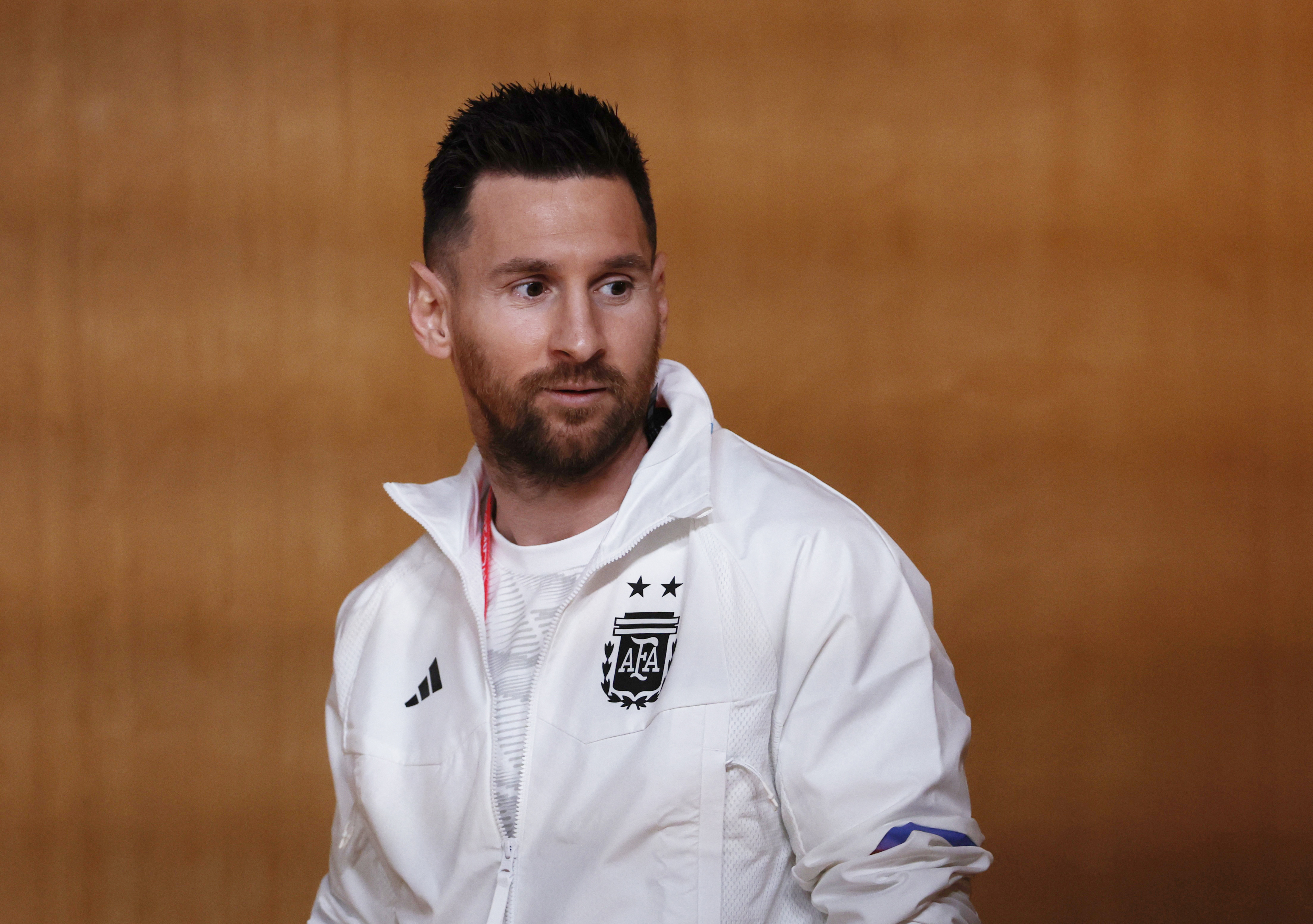 Argentina's Lionel Messi walks out ahead of the press conference