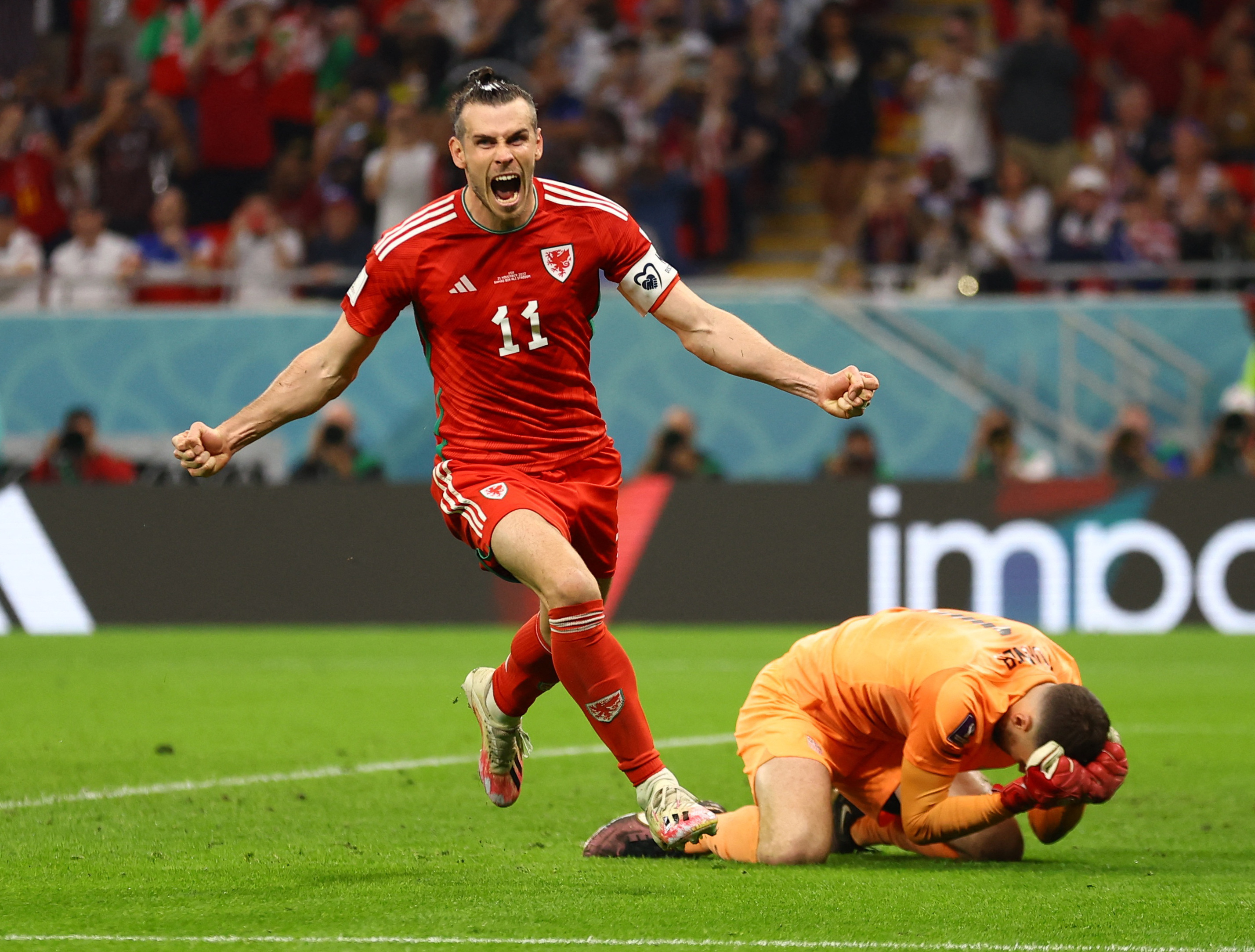 Gareth Bale celebrates scoring their first goal