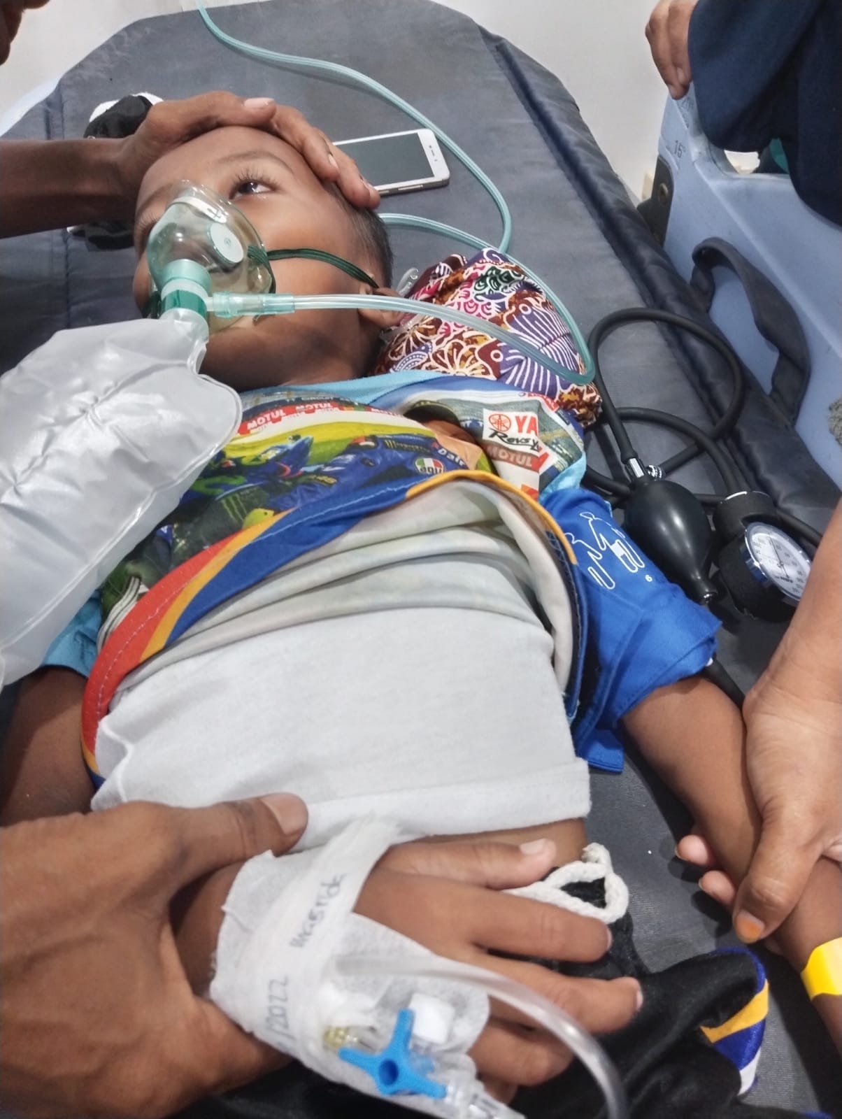 By the time Mohammad Fajar was admitted to hospital for a second time, he was seriously ill. His parents asked that this photo be published to show how sick he was [Courtesy of Mohammad Fajar’s family]
