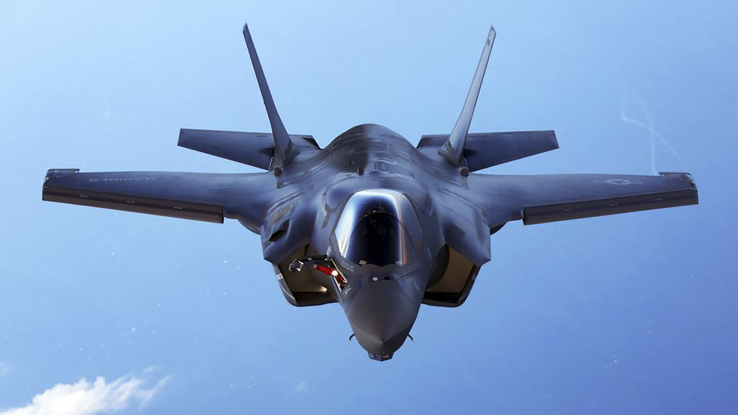 A US Marine Corps F-35B joint strike fighter jet during training over the Atlantic Ocean in this picture released in 2015 [File: US Marine Corps via Reuters]