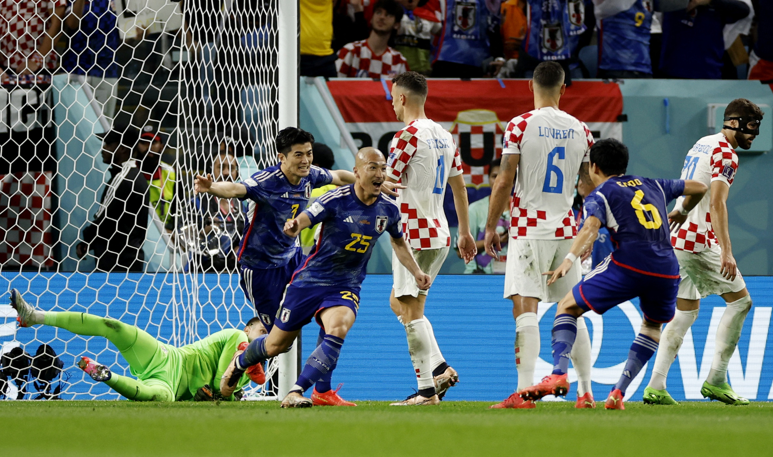 Maeda celebrates scoring Japan's first goa