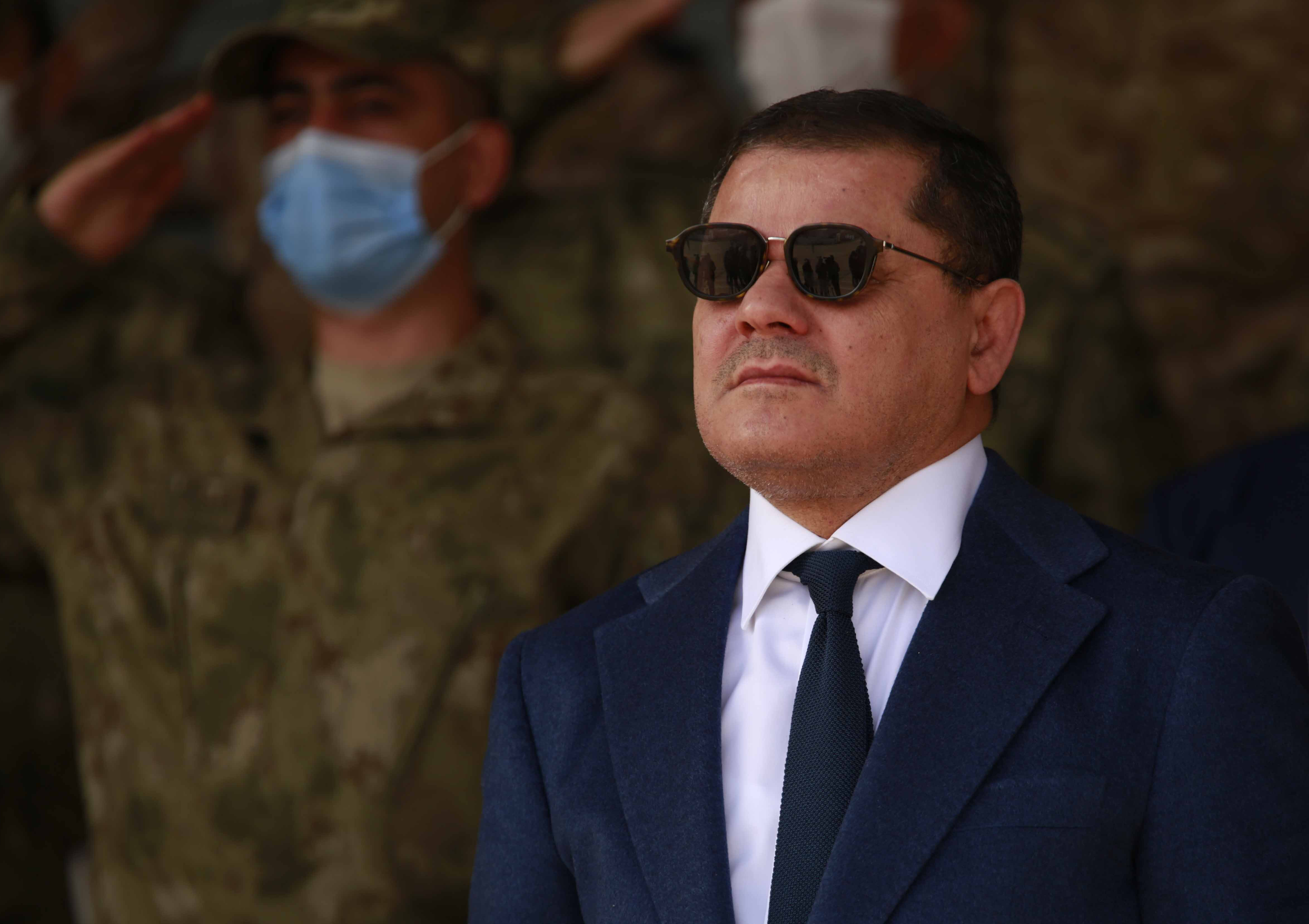 Libyan Prime Minister Abdul Hamid Dbeibah attends the graduation ceremony of a batch of Libyan army cadets in Tripoli