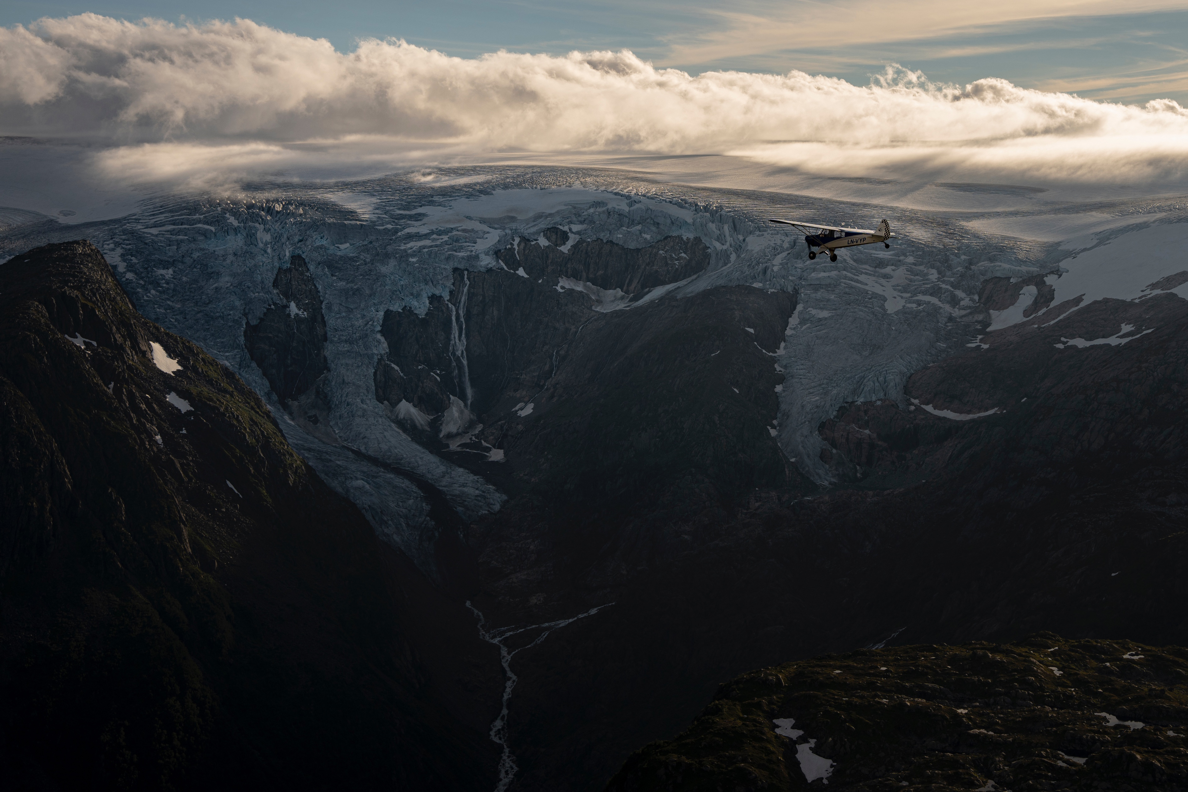 Aviator and adventurer Garrett Fisher flies his plane