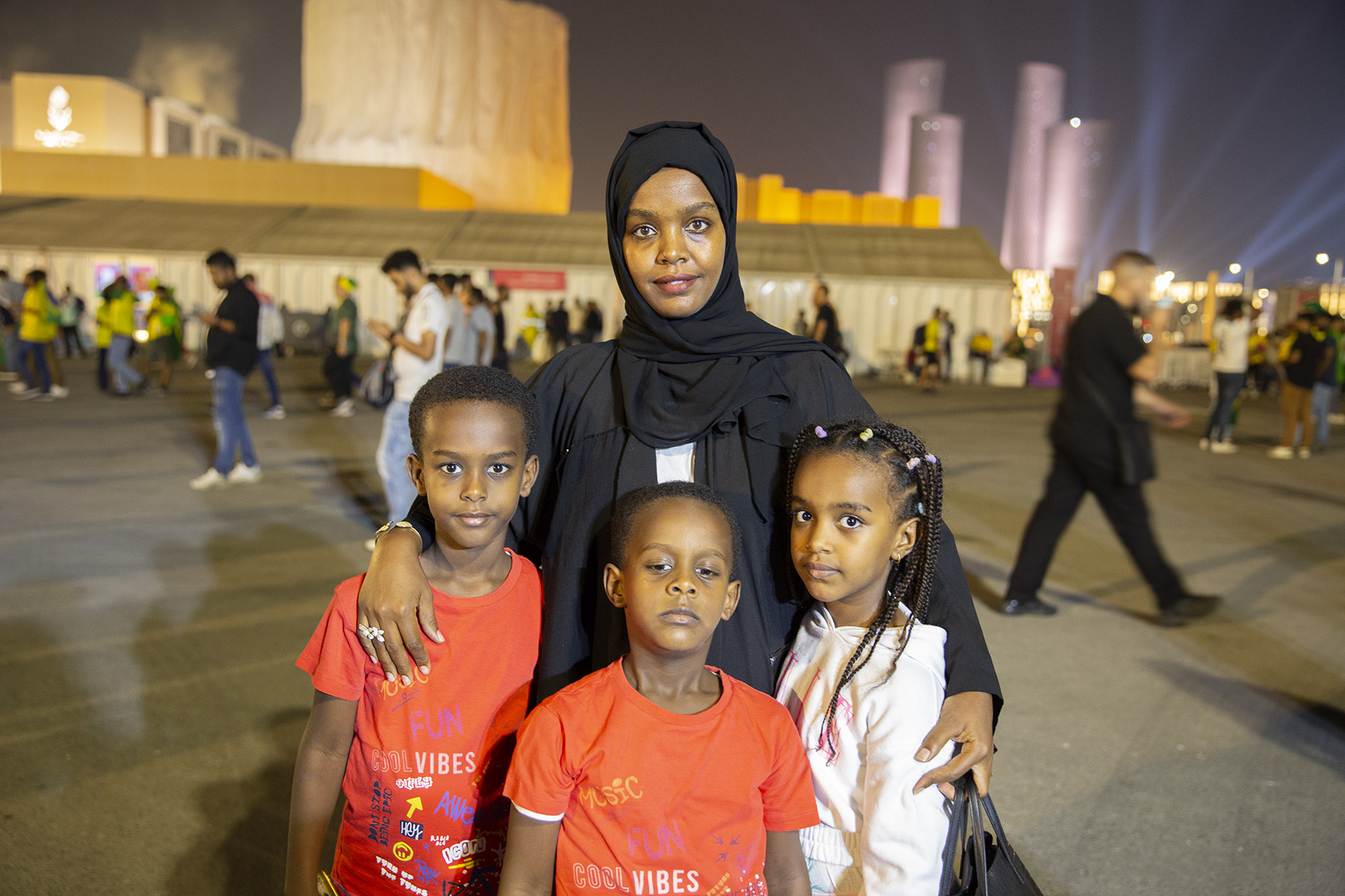 Khadija Suleiman from Ethiopia with her three children at Lusail Stadium for a recent late night game.